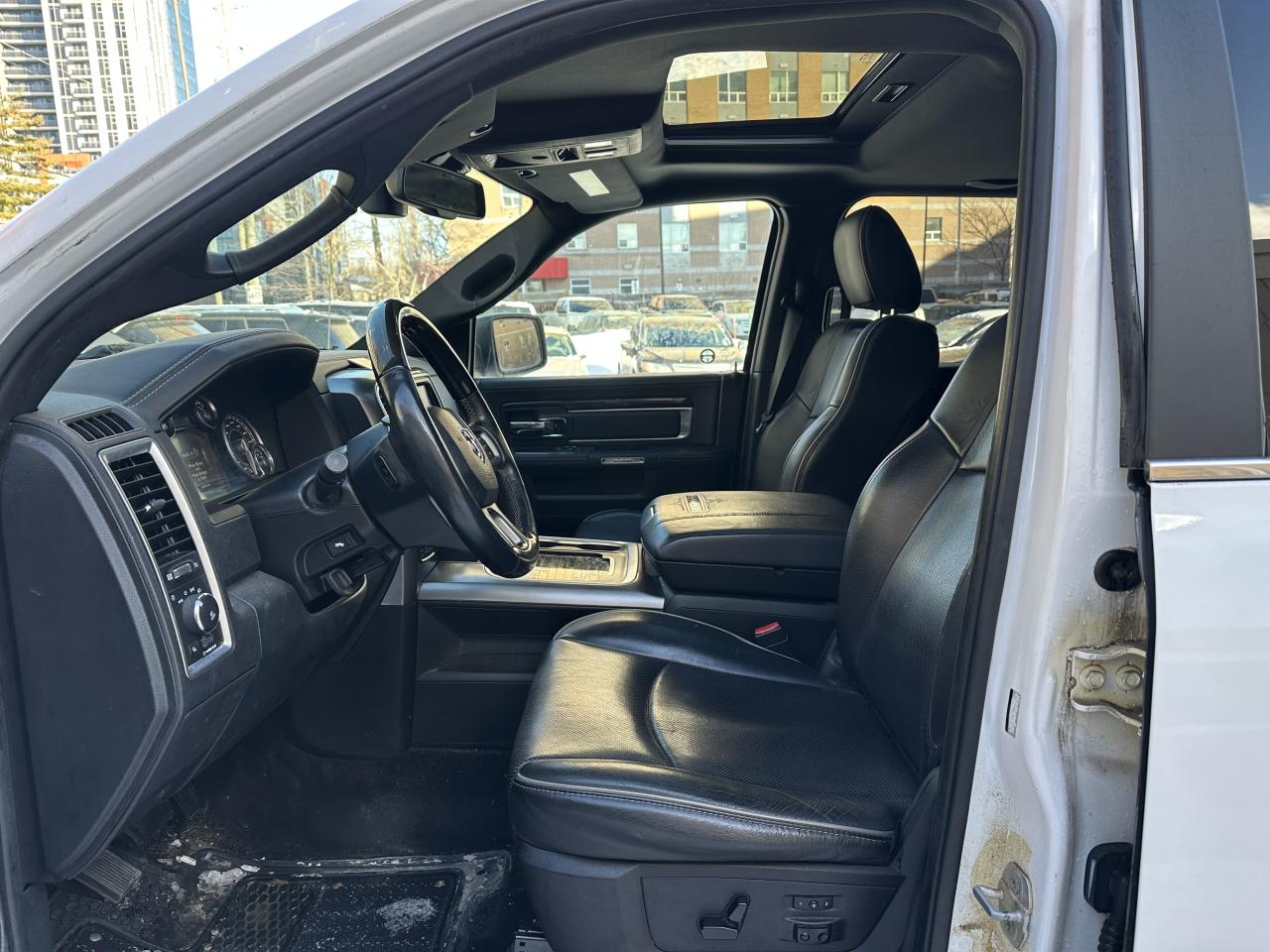 2015 RAM 1500 4WD Crew Cab 140.5" Laramie Ltd 2.0 Photo