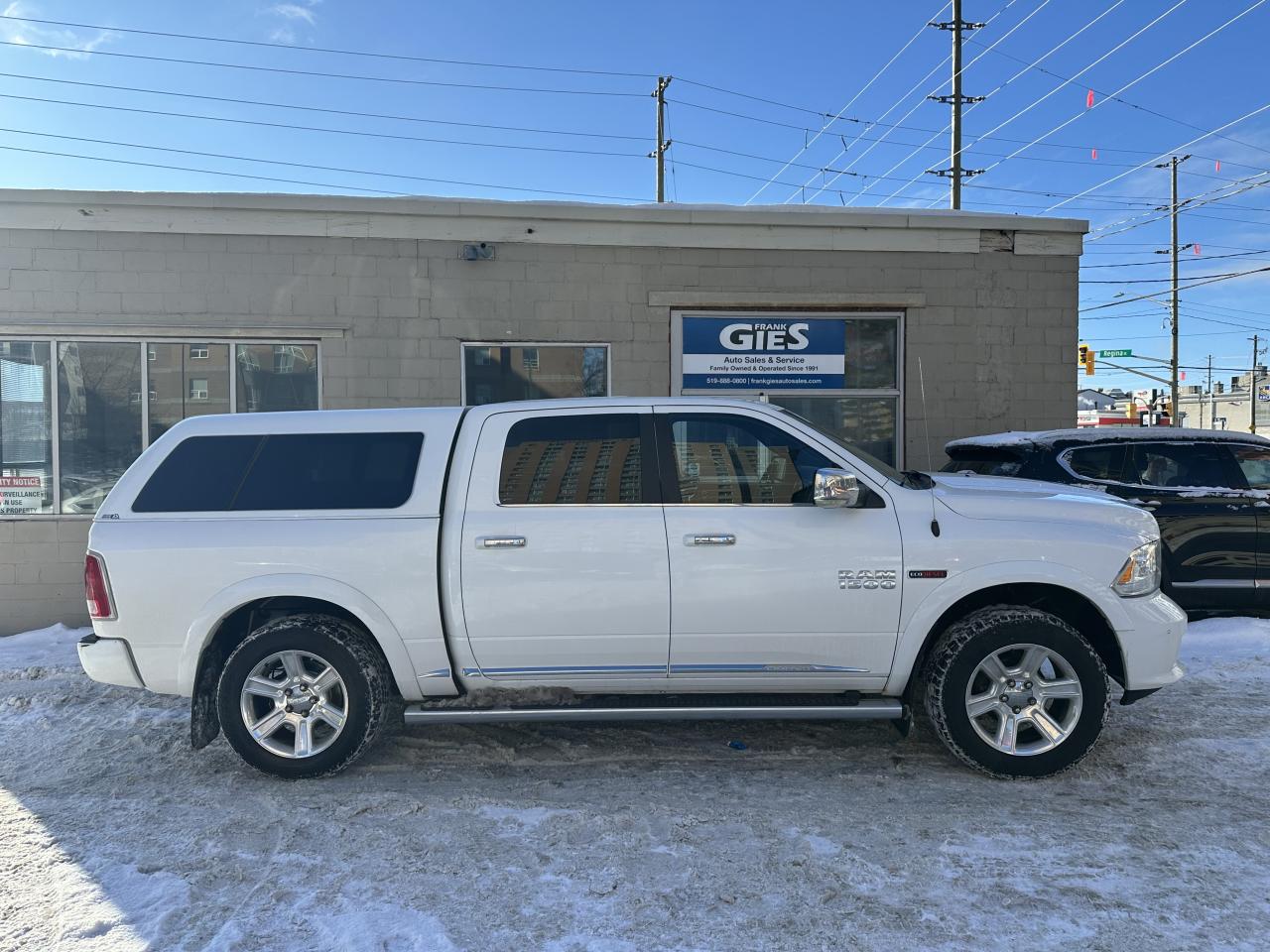 2015 RAM 1500 4WD Crew Cab 140.5" Laramie Ltd 2.0 Photo2