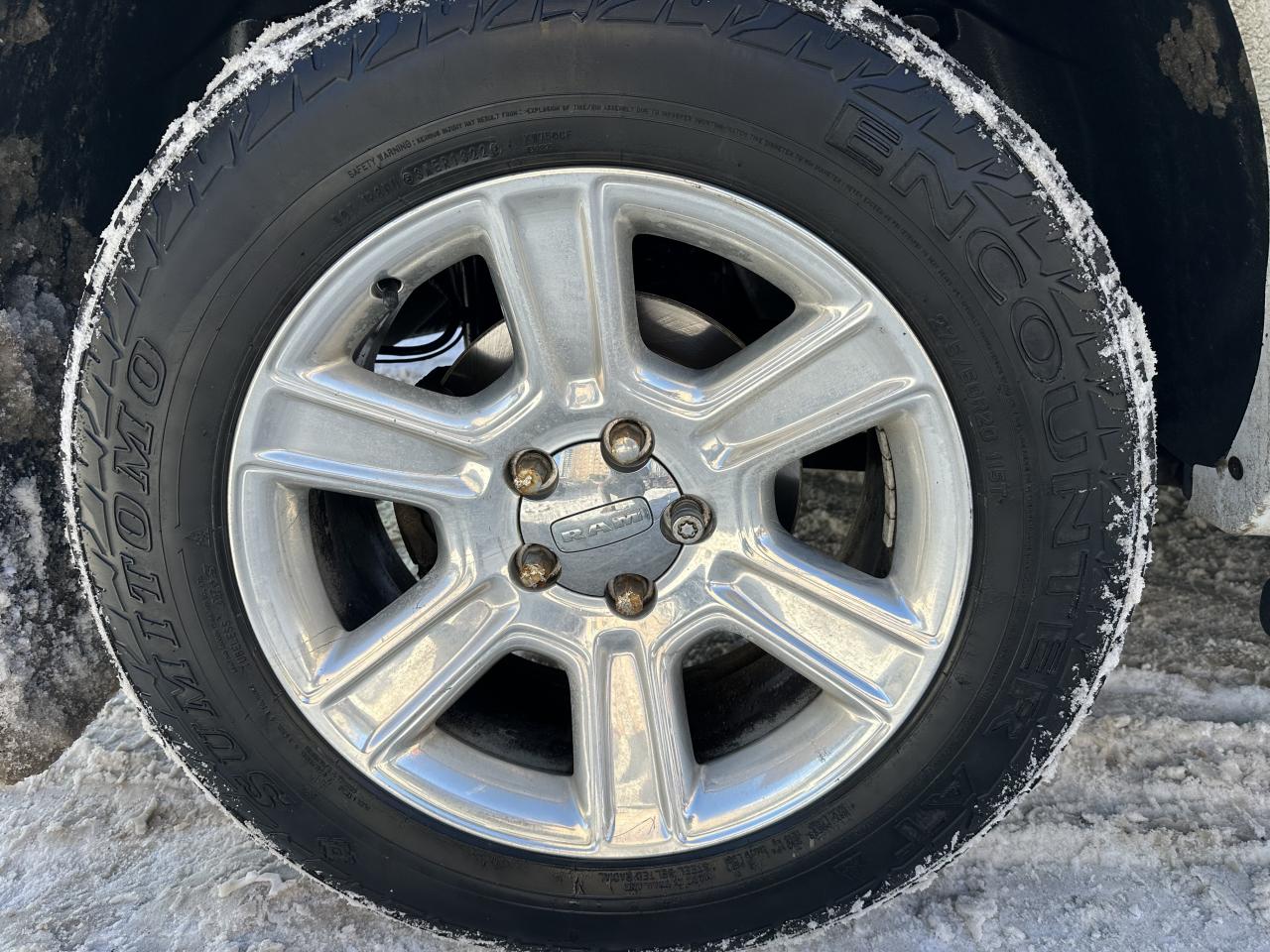 2015 RAM 1500 4WD Crew Cab 140.5" Laramie Ltd 2.0 Photo