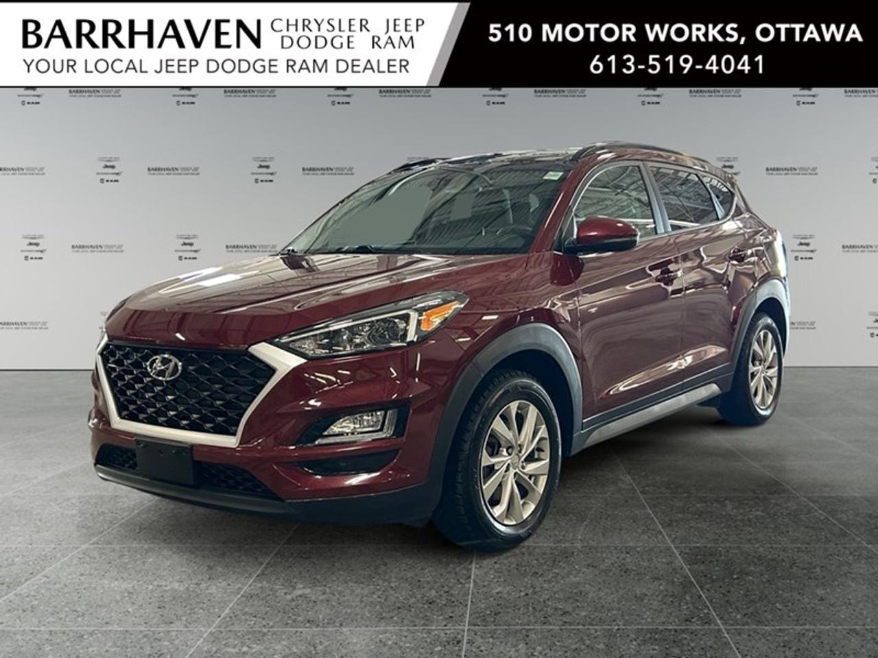 The 2020 Hyundai Tucson Preferred in a striking Maroon finish with AWD is designed to tackle both urban streets and off-road adventures with ease. As an SUV, this Tucson provides a robust driving experience, ensuring you have confident handling in a variety of conditions thanks to its advanced all-wheel-drive system. The exterior shines with elegance, featuring bold lines and modern alloy wheels that enhance its appearance. Step inside to a spacious cabin where comfort meets luxury, with its premium leather seats and leather-trimmed steering components. Experience the joy of open-air driving with a sunroof/moonroof that invites natural light into the meticulously designed interior. Technologically advanced, the Tucson Preferred is equipped with a range of features including a user-friendly backup camera, seamless bluetooth connectivity, and smart device integration. Safety is a priority with features like lane assist and brake assist, providing peace of mind for you and your passengers. Perfect for families and adventure seekers alike, this Tucson offers a blend of practicality and luxury. Reach out to the dealership today for more information and to see how this vehicle can perfectly fit your lifestyle.