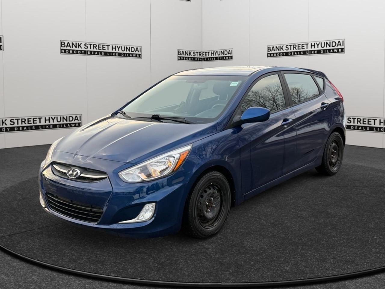 The 2017 Hyundai Accent SE in a captivating Blue finish offers a dynamic driving experience with its responsive FWD drivetrain. Ideal for city commutes and weekend getaways, this hatchback promises ease of maneuverability and efficient performance. The exteriors vibrant Blue color is matched with stylish alloy wheels, projecting a modern and energetic profile. Inside, the vehicle boasts a well-appointed cabin featuring heated front seats and heated mirrors for those chilly Canadian winters. The roomy interior is further enhanced with a power sunroof, inviting natural light and adding an airy feel to your journeys. Technologically, this Accent SE doesnt disappoint. Equipped with connectivity features such as Bluetooth, the vehicle ensures that staying connected is always at your fingertips. Safety is prioritized with features like brake assist and keyless entry, providing peace of mind for you and your passengers. For audiophiles, the satellite radio brings entertainment to your drives. Perfect for urban dwellers and young professionals looking for a reliable and efficient vehicle, the 2017 Hyundai Accent SE proves to be a practical choice. Enjoy the blend of comfort and modern amenities that accompany you on every drive. Contact our dealership today to learn more about this versatile hatchback and to schedule a test drive. Your next adventure is just a call away!