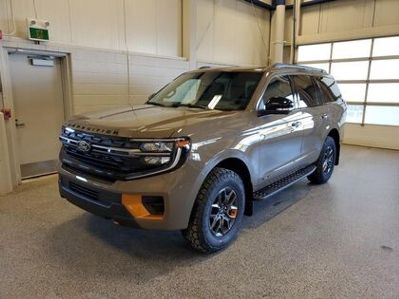 The 2026 Ford Expedition Tremor 501A 4WD shines in Marsh Grey, this premium SUV is powered by a robust 3.5L EcoBoost High Output engine paired with a 10-speed automatic transmission. With 440 horsepower and 510 lb-ft of torque, it delivers dynamic performance, giving a highway/city fuel economy of 13.3L/100km (21 Miles per gallon).

Key Features:
Ford Co-Pilot360® Active 2.0
Heated Front Seats & Rear Seats
Selectable Drive Modes
Modified Higher Ride Suspension
Running Boards
Heavy-Duty Trailer Tow
18 x 8.5 Dark Carbonized Grey Painted Aluminum
Leather Trimmed with Perforated Seat Inserts
B&O® Sound System by Bang & Olufsen
360-Degree Zone Lighting
Power Panoramic Vista Roof® with Power Shade
Front Row 10-way Power Driver & 8-way Power Passenger
Rain Sensing Wipers 
Pro Power Onboard  400 W
LED Taillamps
Power Liftgate
Memory Driver Seat
Engine Block Heater

Moose Jaw Ford, conveniently located at 1010 North Service Road in Moose Jaw, is your trusted destination for all your automotive needs. With an impressive 4.8-star Google rating from nearly 1,500 reviews, we are proud to deliver an exceptional vehicle-buying experience tailored just for you. Our Moose Jaw Motives set us apart, offering unbeatable value like half-priced oil changes for life on pre-owned vehicles, one year of key and remote protection, and one year of tire and rim protection. Enjoy peace of mind with every purchase. At Moose Jaw Ford, were committed to driving positive change in our community by combining exceptional service, high-quality vehicles, and a guest-first approach. Visit us today!