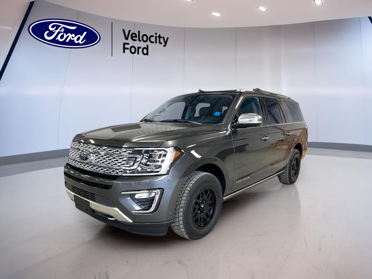 Take on big roads and bigger plans in this used 2021 Ford Expedition Platinum Max, now at Velocity Ford in Moose Jaw. Finished in grey with a black interior, this full-size SUV brings confident 4WD capability, a smooth automatic transmission, and a proven 3.5 L gas engine. With 204,985 km, its ready for the next owner who needs real space, real comfort, and real towing-friendly utility.

Built for families, travel, and long highway days, this used 2021 Ford Expedition Platinum Max makes daily driving easy with smart convenience features like push-button start, remote starter, power windows, and power steering. The cabin feels upscale and practical, with dual-zone climate control up front plus rear climate control and rear air conditioning to keep every row comfortable. A panoramic sunroof and tinted windows add an open, premium feel without giving up privacy.

ADVANCED SAFETY FEATURES  
»» Anti-lock braking system for controlled stops  
»» Stability control for confident handling  
»» Blind spot monitor for safer lane changes  
»» Lane departure warning for added awareness  

PERFORMANCE AND EFFICIENCY  
»» 3.5 L gas engine power  
»» Four-wheel drive for year-round traction  
»» Automatic transmission with dual shift mode  
»» Adjustable suspension for composed ride  

COMFORT AND CONVENIENCE  
»» Dual-zone automatic climate control comfort  
»» Rear climate control for all rows  
»» Heated front seats for cold mornings  
»» Heated rear seats for passenger comfort  

TECHNONOLGY AND CONNECTIVITY  
»» Navigation system for clear route guidance  
»» Bluetooth integration for hands-free calling  
»» Satellite radio and HD Radio  
»» WiFi hotspot for connected travel  

CARGO SPACE  
»» Power liftgate for easy loading  
»» Rear trunk access for quick reach  
»» Remote trunk release for convenience  
»» Spare tire onboard for peace of mind  

WHAT OTHER OWNERS LIKE  
»» Strong highway ride for long trips  
»» Spacious cabin for families and gear  
»» Confident 4WD traction in winter  
»» Helpful driver aids for daily commuting  

This used 2021 Ford Expedition Platinum Max also includes practical exterior and driver-focused touches that make a difference in Moose Jaw conditions. You get LED headlamps, automatic headlights, fog lights, heated mirrors, retractable mirrors with turn signals, and a rear window defroster for clear visibility. Power retractable running boards and steps help passengers climb in with ease, while a backup camera supports safer parking and tight maneuvers.

Inside, the details are set up for comfort and control: steering wheel audio controls, cruise control, an auto-dimming rearview mirror, ambient lighting, and memory settings for seats and mirrors. Driver and passenger lumbar support, adjustable pedals, and an adjustable steering wheel help you dial in the right driving position for long days behind the wheel.

This 2021 Ford Expedition Platinum Maxs VIN is: 1FMJK1MT7MEA85349.