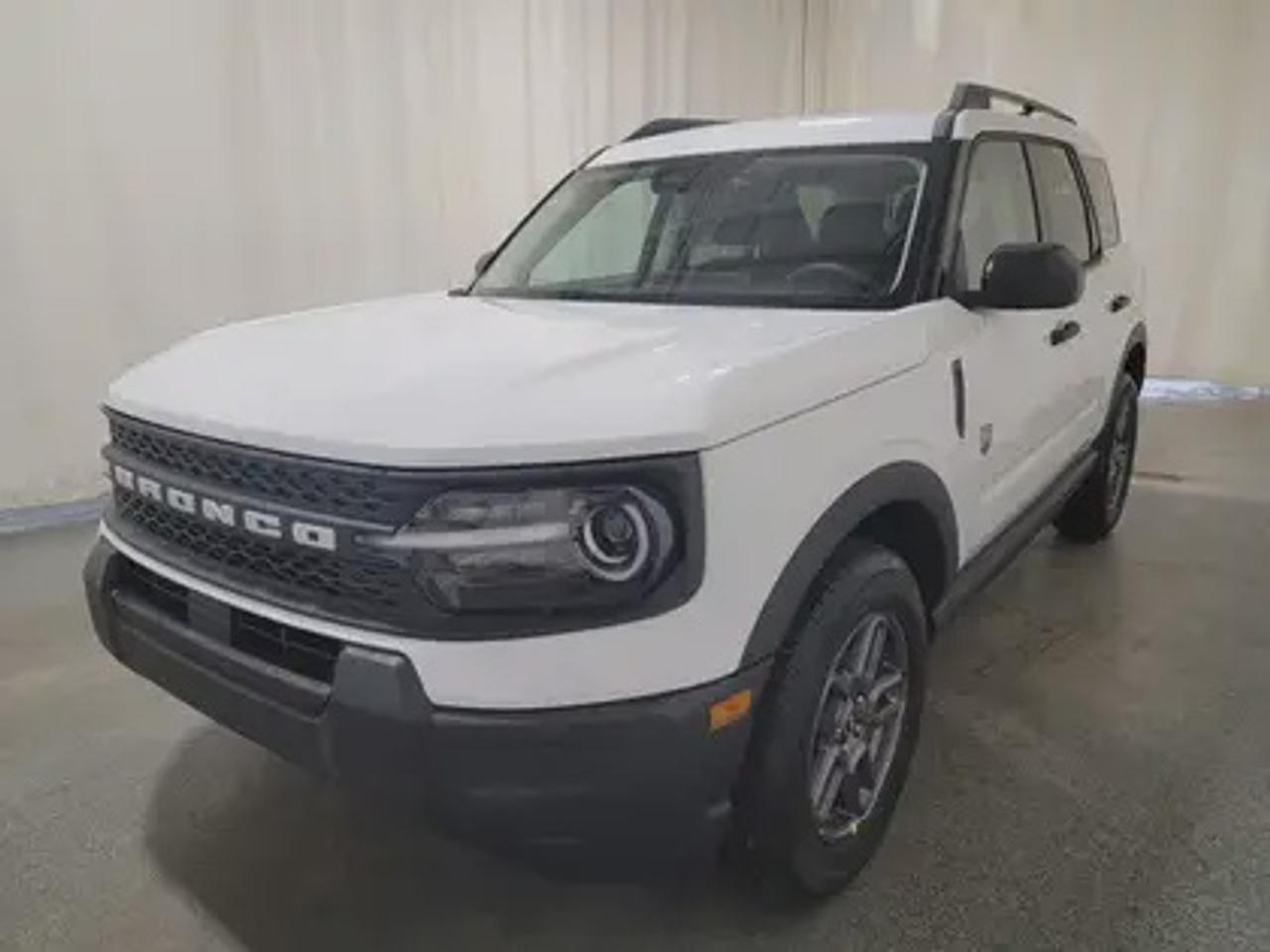 This rugged and refined 2026 Ford Bronco Sport Big Bend 200A stands out in Oxford White. Built to tackle adventure and city streets alike, this 5-passenger SUV is powered by a 1.5L EcoBoost® engine, delivering 181 horsepower and 190 lb-ft of torque. Coupled with an 8-speed automatic transmission, the Bronco Sport offers impressive fuel efficiency and performance to match your lifestyle.

Key Features Include:
Heated Front Seats
13.2 Center Display
8-Way Power Drivers Seat
SYNC® 4 with a 13.2 Color Touchscreen
Ford Co-Pilot360 Assist+ featuring Adaptive Cruise Control with Stop & Go
Terrain Management System with 5 G.O.A.T. Modes
LED Headlamps, Fog Lamps, and Signature Lighting
17 Carbonized Grey-Painted High Gloss Aluminum Wheels
Wireless Apple CarPlay® and Android Auto Compatibility
Privacy Glass
Intelligent Access with Push-Button Start

This vehicle comes with the All-Weather Packageready to take on any season!
Snow, rain, mud, or sunshinethis vehicle is built for it all! The All-Weather Package adds extra protection where it matters most, with premium mud flaps to shield your paint from road debris, all-weather floor mats to protect your interior from lifes messes, and Xpel paint protection to help guard against those infuriating rock chips. Drive with confidence, knowing your investment is protected from Reginas elements.
 
Bennett Dunlop Ford, proudly serving Regina for over 40 years, is conveniently located at 770 Broad Street. With over 3,500 Google reviews, our reputation reflects our commitment to providing a fast, easy, and enjoyable vehicle-buying experience. We eliminate the hassle with no admin or documentation fees, transparent upfront pricing that lets you shop with total confidence. But were more than just a dealershipwere driven to make a difference by supporting local community initiatives and events that matter to you. Visit Bennett Dunlop Ford today and experience why were Reginas trusted choice for quality vehicles, exceptional service, and a genuine commitment to driving change in our community!