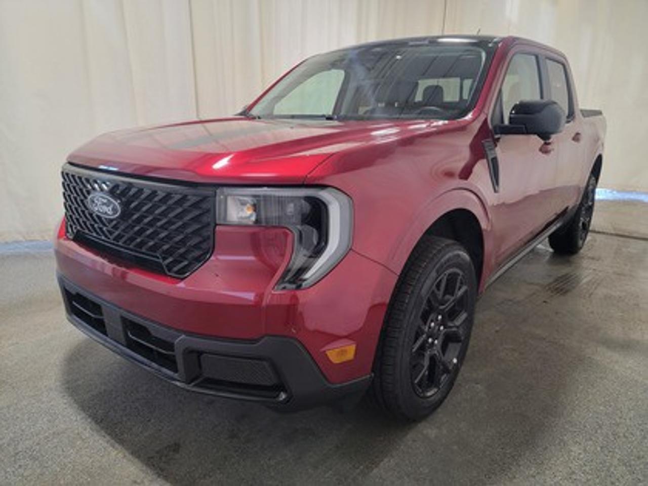 This all-new 2026 Ford Maverick Lariat 502A looks absolutely stunning in Ruby Red Metallic Tinted Clear Coat. This versatile compact pickup is powered by the 2.0L EcoBoost® engine, delivering 250 horsepower and 277 lb-ft of torque. Paired with an 8-speed automatic transmission, the Maverick is designed to provide an efficient 9.4L/100 km (30 Mile Per Galon) combined fuel economy, making it a practical yet powerful option for city and highway driving.

This vehicle comes with the All-Weather Packageready to take on any season!

Snow, rain, mud, or sunshinethis vehicle is built for it all! The All-Weather Package adds extra protection where it matters most, with premium mud flaps to shield your paint from road debris, all-weather floor mats to protect your interior from lifes messes, and Xpel paint protection to help guard against those infuriating rock chips. Drive with confidence, knowing your investment is protected from Regina's elements.

Key Features:
Tire Inflator and Sealant Kit
Ford Connectivity Kit
Lane-Keeping System
B&O Sound System by Bang & Olufsen with HD Radio (8 Speakers, including Subwoofer)
Ford Co-Pilot360 Assist 2.0
360-Degree Camera
Adaptive Cruise Control with Lane Centering
Blind Spot Information System (BLIS®) with Cross-Traffic Alert
Heated Front Seats & Heated Steering Wheel
LED Box Lighting
Remote Start System
Spray-In Bed Liner
19 Machined-Painted Aluminum Wheels
Power Tailgate Lock
Pre-Collision Assist with Automatic Emergency Braking
Trailer Sway Control
Rear View Camera
SYNC® 4 with Enhanced Voice Recognition
Wireless Apple CarPlay® & Android Auto
Black Appearance Package
4k Tow Package
Power Sliding Rear Window

The 2026 Maverick Lariat 502A is built to handle Saskatchewans extreme weather and road conditions, ensuring a premium driving experience. With heated front seats, a heated steering wheel, power-adjustable drivers seat, rear under-seat storage bins, and intuitive safety features, this truck is perfect for drivers who want a balance of efficiency, comfort, and high-tech convenience.

Bennett Dunlop Ford, proudly serving Regina for over 40 years, is conveniently located at 770 Broad Street. With over 3,500 Google reviews, our reputation reflects our commitment to providing a fast, easy, and enjoyable vehicle-buying experience. We eliminate the hassle with no admin or documentation fees, transparent upfront pricing that lets you shop with total confidence. But were more than just a dealershipwere driven to make a difference by supporting local community initiatives and events that matter to you. Visit Bennett Dunlop Ford today and experience why were Reginas trusted choice for quality vehicles, exceptional service, and a genuine commitment to driving change in our community!