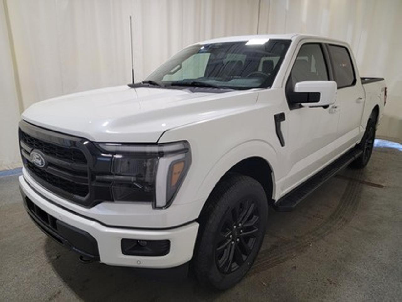 The all-new 2026 Ford F-150 Lariat 502A looks absolutely stunning in Star White Metallic Tricoat. This pickup comes with the 3.5L V6 EcoBoost engine. This remarkable engine not only produces 400 horsepower and 500 ft-lbs of torque, but by leveraging this advanced technology and a 10-speed automatic transmission, this truck is rated to get 12.3L/100km (23 miles per gallon) combined highway/city fuel economy.

This vehicle comes with the All-Weather Packageready to take on any season!

Snow, rain, mud, or sunshinethis vehicle is built for it all! The All-Weather Package adds extra protection where it matters most, with premium mud flaps to shield your paint from road debris, all-weather floor mats to protect your interior from lifes messes, and Xpel paint protection to help guard against those infuriating rock chips. Drive with confidence, knowing your investment is protected from Regina's elements.

Key Features:
Ford Co-Pilot360 Assist 2.0
Adaptive Cruise Control
360-Degreee Camera
Lane Centering Assist
Evasive Steering Assist
Front Parking Sensors
14 Speaker B&O Sound System
Connected Navigation
Remote Start System
Universal Garage Door Opener
Heated Steering Wheel
Memory Driver Seat
Heated And Ventilated Front Seats
Heated Rear Seats
Lariat Black Appearance Package
Twin Panel Moonroof
Bed Utility Package

Saskatchewan has a challenging climate and driving conditions, but let that stress melt away with the 2026 F-150 Lariat, a tough truck that leverages physical features and technology to keep your family safe. This specific unit is loaded with features, including power windows, power locks, dual-zone electronic automatic temperature control, 10-way power drivers seat with memory, wrapped steering wheel, zone lighting, cruise control, dynamic brake support, outside temperature display, hill start assist, perimeter alarm system, four-wheel drive, and so much more.

Bennett Dunlop Ford, proudly serving Regina for over 40 years, is conveniently located at 770 Broad Street. With over 3,500 Google reviews, our reputation reflects our commitment to providing a fast, easy, and enjoyable vehicle-buying experience. We eliminate the hassle with no admin or documentation fees, transparent upfront pricing that lets you shop with total confidence. But were more than just a dealershipwere driven to make a difference by supporting local community initiatives and events that matter to you. Visit Bennett Dunlop Ford today and experience why were Reginas trusted choice for quality vehicles, exceptional service, and a genuine commitment to driving change in our community!