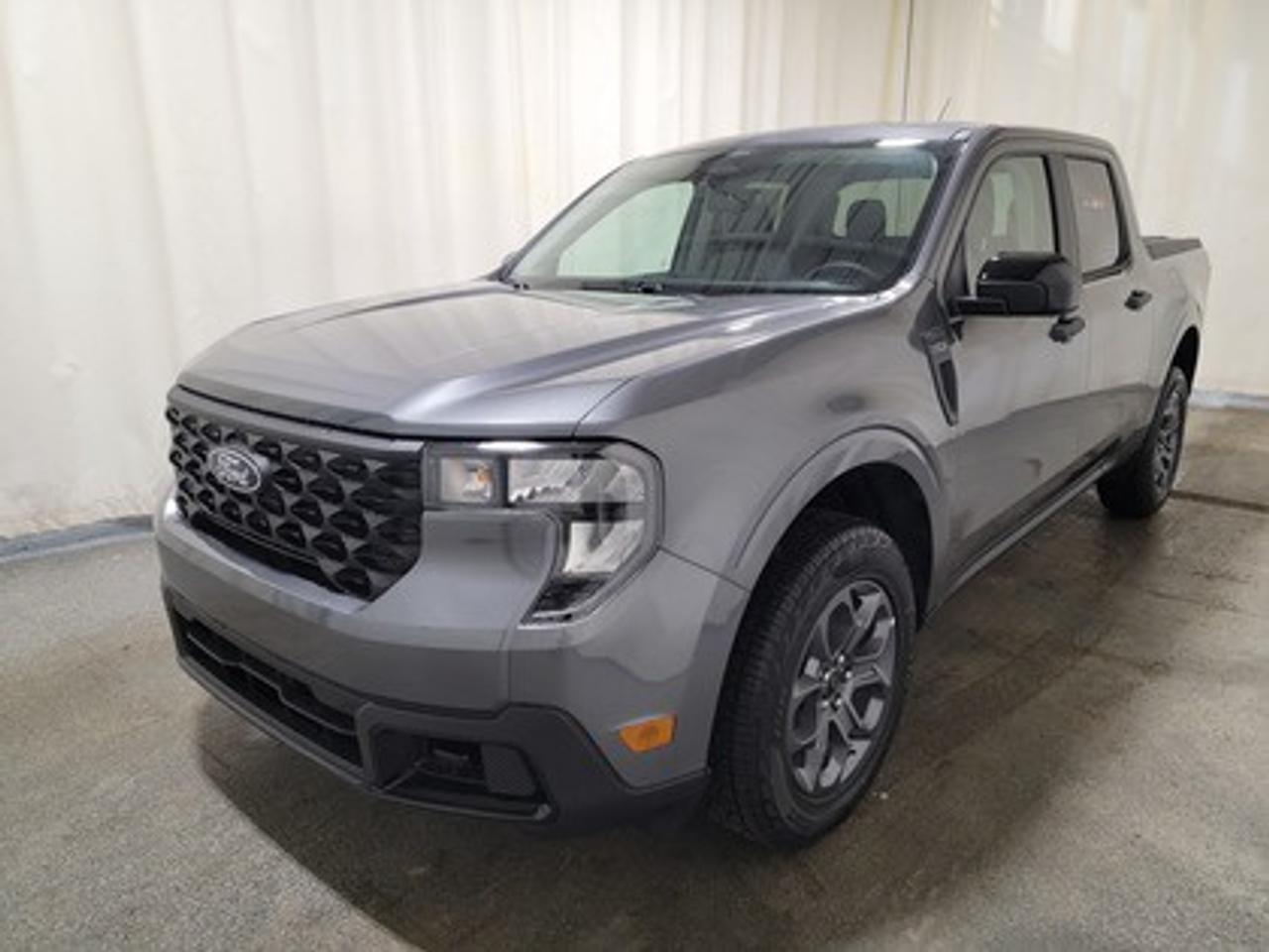 This 2026 Ford Maverick XLT stands out in Carbonized Grey combining the versatility of a pickup with the efficiency and convenience of a compact truck. Equipped with the 2.0L EcoBoost® engine, this truck delivers 250 horsepower and 277 lb-ft of torque, paired with an 8-speed automatic transmission for smooth performance and an estimated 9.4L/100 km (30 miles per gallon) combined fuel economy.

Key Features:
Tire Inflator and Sealant Kit
FordPass Connectivity for remote vehicle control
Ford Co-Pilot360
Trailer Sway Control
Remote Keyless Entry
17 Carbonized Grey-Painted Aluminum Wheels
P225/65R17 A/S BSW Wheels
Lane Keeping Aid
Rear View Camera
Automatic LED High Beams
LED Headlamps
Manual Tailgate Lock
8 Center Stack Screen
Electronic Stability Control
Cruise Control
XLT Luxury Package

This vehicle comes with the All-Weather Packageready to take on any season!
Snow, rain, mud, or sunshinethis vehicle is built for it all! The All-Weather Package adds extra protection where it matters most, with premium mud flaps to shield your paint from road debris, all-weather floor mats to protect your interior from lifes messes, and Xpel paint protection to help guard against those infuriating rock chips. Drive with confidence, knowing your investment is protected from Regina's elements.

Bennett Dunlop Ford, proudly serving Regina for over 40 years, is conveniently located at 770 Broad Street. With over 3,500 Google reviews, our reputation reflects our commitment to providing a fast, easy, and enjoyable vehicle-buying experience. We eliminate the hassle with no admin or documentation fees, transparent upfront pricing that lets you shop with total confidence. But were more than just a dealershipwere driven to make a difference by supporting local community initiatives and events that matter to you. Visit Bennett Dunlop Ford today and experience why were Reginas trusted choice for quality vehicles, exceptional service, and a genuine commitment to driving change in our community!
