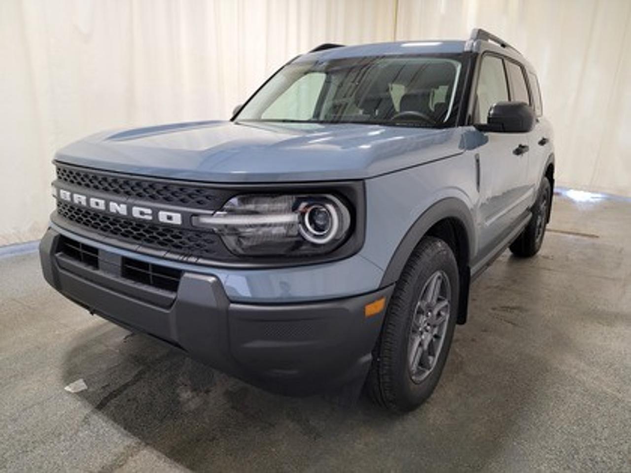 This rugged and refined 2026 Ford Bronco Sport Big Bend 200A stands out in Azure Grey Metallic Tri-Coat. Built to tackle adventure and city streets alike, this 5-passenger SUV is powered by a 1.5L EcoBoost® engine, delivering 181 horsepower and 190 lb-ft of torque. Coupled with an 8-speed automatic transmission, the Bronco Sport offers impressive fuel efficiency and performance to match your lifestyle.

This vehicle comes with the All-Weather Packageready to take on any season! 

Snow, rain, mud, or sunshinethis vehicle is built for it all! The All-Weather Package adds extra protection where it matters most, with premium mud flaps to shield your paint from road debris, all-weather floor mats to protect your interior from lifes messes, and Xpel paint protection to help guard against those infuriating rock chips. Drive with confidence, knowing your investment is protected from Regina's elements. 

Key Features Include:
Heated Front Seats
13.2 Center Display
8-Way Power Drivers Seat
SYNC® 4 with a 13.2 Color Touchscreen
Ford Co-Pilot360 Assist+ featuring Adaptive Cruise Control with Stop & Go
Terrain Management System with 5 G.O.A.T. Modes
LED Headlamps, Fog Lamps, and Signature Lighting
17 Carbonized Grey-Painted High Gloss Aluminum Wheels
Wireless Apple CarPlay® and Android Auto Compatibility
Privacy Glass
Intelligent Access with Push-Button Start

Saskatchewans weather is no match for the Bronco Sport Big Bend, thanks to its thoughtful design and advanced technology. The vehicle offers enhanced safety features such as BLIS® (Blind Spot Information System) with Cross-Traffic Alert, Hill Start Assist, and a Rearview Camera with Backup Assist Grid Lines. Inside, comfort is prioritized with electronic automatic temperature control, a premium sound system, heated front seats, and additional storage solutions.

Bennett Dunlop Ford, proudly serving Regina for over 40 years, is conveniently located at 770 Broad Street. With over 3,500 Google reviews, our reputation reflects our commitment to providing a fast, easy, and enjoyable vehicle-buying experience. We eliminate the hassle with no admin or documentation fees, transparent upfront pricing that lets you shop with total confidence. But were more than just a dealershipwere driven to make a difference by supporting local community initiatives and events that matter to you. Visit Bennett Dunlop Ford today and experience why were Reginas trusted choice for quality vehicles, exceptional service, and a genuine commitment to driving change in our community!