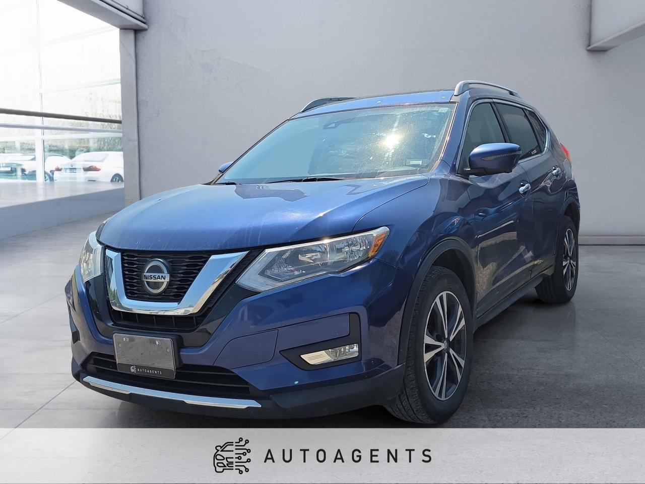<p>This 2019 Nissan Rogue SV AWD in eye-catching blue delivers a perfect balance of comfort, safety, and all-weather capability, making it an ideal choice for families and commuters alike. Powered by a 2.5-liter DOHC 4-cylinder engine paired with an Xtronic CVT and Intelligent All-Wheel Drive, it offers a smooth, efficient ride with confident traction in varying road conditions. The SV trim adds a host of premium features, including 17-inch aluminum-alloy wheels, body-color heated side mirrors with integrated turn signals, roof rails, and keyless entry with push-button start. Inside, the spacious cabin is equipped with premium cloth seats, a power-adjustable drivers seat with lumbar support, dual-zone automatic climate control, and a leather-wrapped steering wheel with mounted audio and cruise controls. Rear passengers enjoy ample legroom and reclining seatbacks. With its comfortable ride, advanced tech, and intelligent safety, this 2019 Rogue SV AWD is ready for whatever the road brings.</p>