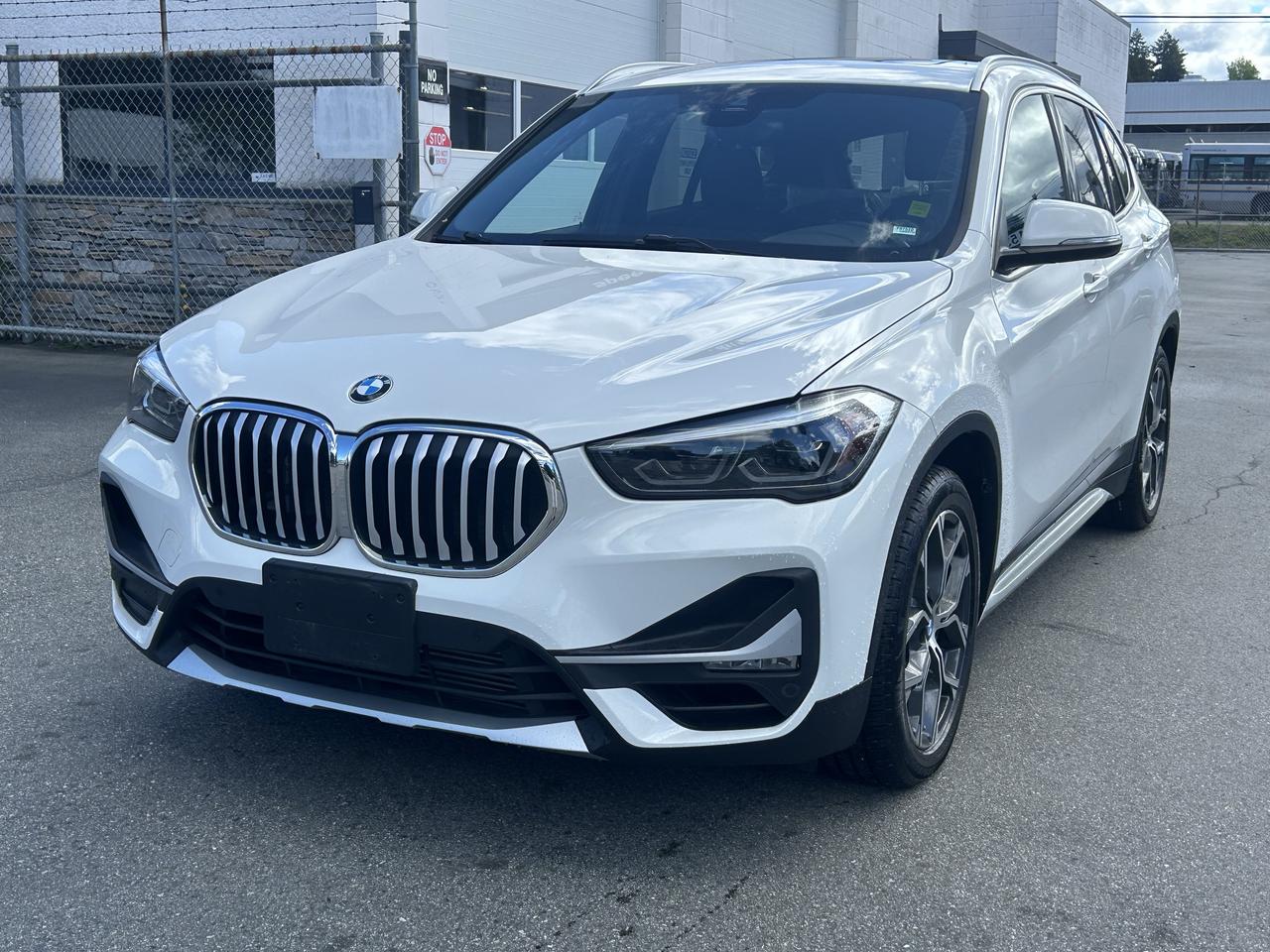 <p>**2020 BMW X1 xDrive28i | Local One Owner | Dealer Serviced | Loaded | Only [KM]**</p><p>Looking for a premium compact SUV with performance, luxury, and great value? This **2020 BMW X1 xDrive28i** is a **local one-owner vehicle**, finished in **Alpine White on Black interior**, and has been **fully dealer serviced as per Carfax**.</p><p>This unit is **extremely well equipped** with over **$4,500 in factory options**, including the highly desirable **Premium Essential Package** &mdash; making it one of the best value luxury SUVs on the market.</p><p>**Key Features & Options:**</p><p>* xDrive All-Wheel Drive<br>* 2.0L Turbocharged Engine<br>* 8-Speed Automatic Transmission<br>* Premium Essential Package</p><p>&nbsp; * Panoramic Sunroof<br>&nbsp; * Heated Steering Wheel<br>&nbsp; * Heated Front Seats<br>&nbsp; * Comfort Access Keyless Entry<br>&nbsp; * LED Headlights<br>&nbsp; * Power Folding Mirrors<br>* Navigation System<br>* Apple CarPlay<br>* Backup Camera<br>* Active Safety Features (Lane Departure, Collision Warning)<br>* Power Liftgate<br>* Dual Zone Climate Control<br>* Bluetooth Connectivity<br>* Cruise Control<br>* Alloy Wheels</p><p>**Bonus:** Comes with **both summer and winter tires** &mdash; ready for all seasons.</p><p>This X1 offers the perfect balance of **luxury, practicality, and fuel efficiency**, and drives exactly how a BMW should.</p><p>---</p><p>**Estimated Payments:**<br>$0 Down OAC<br>Approx. **$295 Bi-Weekly @ 7.99% over 72 months**</p><p>---</p><p>**Why Buy From Milani Auto Sales?**<br>✔ Serving Burnaby for over 30 years<br>✔ 4.9★ Google Rating (97 Reviews)<br>✔ All vehicles fully inspected</p><p>Every vehicle comes with a **FREE 90-Day Powertrain Warranty** for your peace of mind.<br>You can also take the **$395 value of that warranty and upgrade** to a **12, 24, or 36-month Lubrico warranty** for extended coverage.</p><p>**Ask us how to customize your warranty coverage to fit your budget.**</p><p>---</p><p>**Price:** $18,990 + $395 Documentation Fee + Taxes</p><p>---</p><p>**Trades Welcome / Paid For or Not**</p><p>Visit us online: [www.milani.biz](http://www.milani.biz)</p>