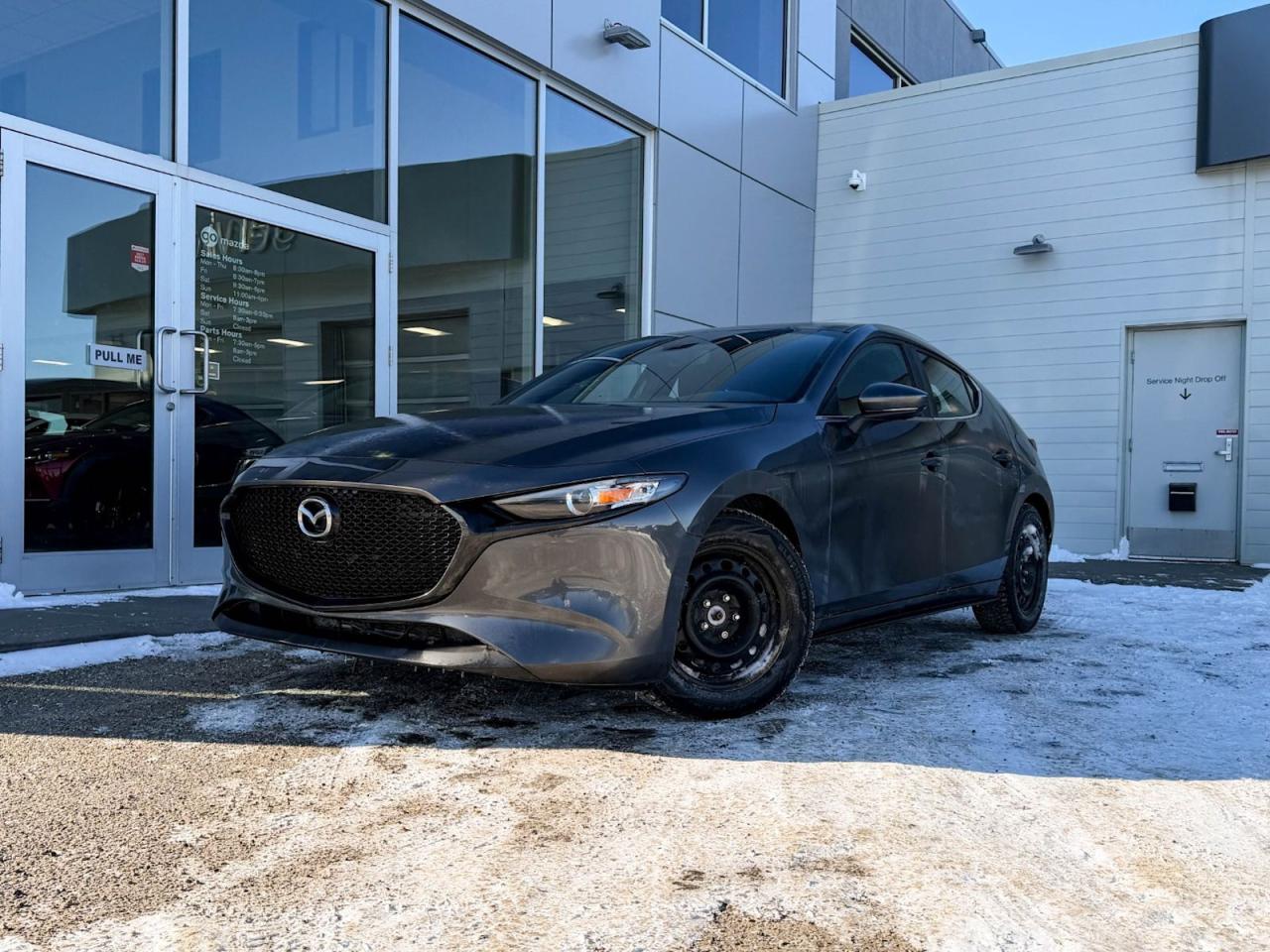 Discover the thrill of driving with this pre-owned 2022 Mazda Mazda3 Sport GX in sleek Machine Grey Metallic! Powered by a responsive 2.0L SKYACTIV-G engine and paired with a fun-to-drive 6-speed manual transmission, this sporty compact offers precise handling and excellent fuel efficiency. Enjoy heated front seats, modern cloth upholstery, and a premium AM/FM/HD audio system with an 8.8-inch touchscreen for seamless connectivity. Safety is top-notch with multiple airbags, blind spot warning, rear collision warning, and advanced stability controls. With stylish 16 alloy wheels and a host of tech features including push-button start, keyless entry, and smart device mirroring, this Mazda3 Sport GX blends performance, comfort, and convenience perfectly. Test drive it today and experience Mazdas signature driving excitement!Vehicle has a claim on the Carfax of $7494Go Mazda is an AMVIC licenced buisness