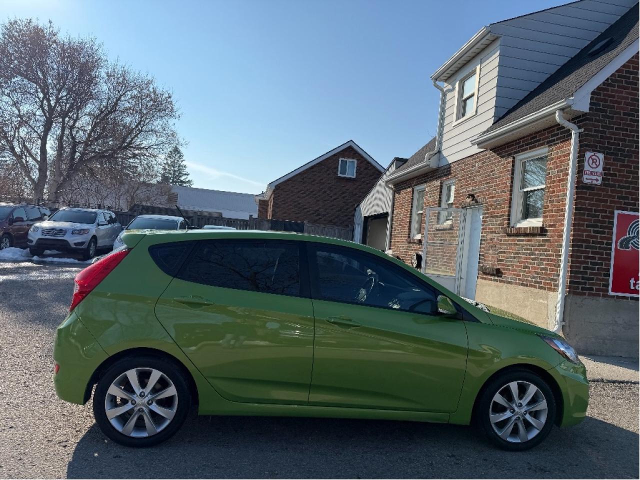 2014 Hyundai Accent GLS | Very Low Mileage | Drives Great !! Photo