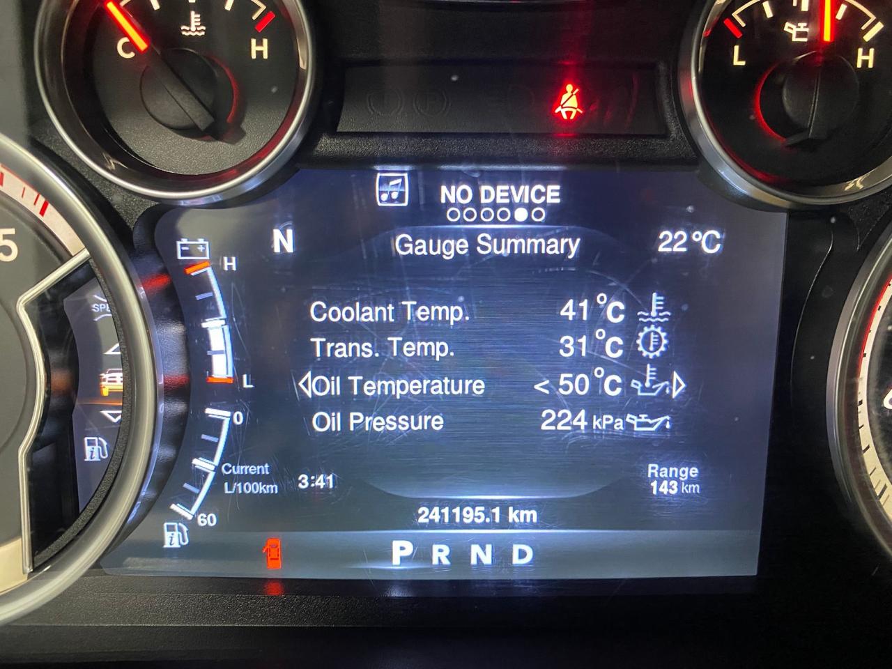 2016 RAM 1500 4WD Quad Cab 140.5" Laramie Photo