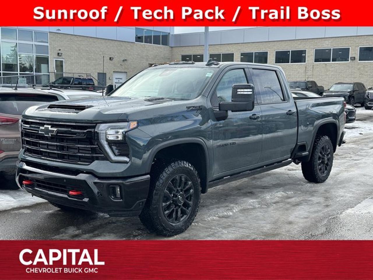Accessories Include: Suntek protective film.This Chevrolet Silverado 3500HD boasts a Turbocharged Diesel V8 6.6L/403 engine powering this Automatic transmission. Z71 OFF-ROAD PACKAGE includes (Z71) Off-Road suspension with off-road tuned twin tube Rancho shocks, (JHD) Hill Descent Control and (NZZ) skid plates (transfer case and oil pan) 4X4 decals on bed are replaced with Z71 fender badge., TRANSMISSION, 10-SPEED AUTOMATIC, TRAIL BOSS PACKAGE includes black grille bar with Chevy Black Bow Tie, Black grille inserts, (SRI) 20 High gloss Black painted wheels, (VB5) High Gloss Black painted front bumper, (VT5) High Gloss Black painted rear bumper, (UGA) Red Tow Hooks, (QFG) LT275/65R20 BF Goodrich off-road tires, Black skid plate, Black badging, Black bowtie on horn pad, (DP6) High Gloss Black mirror caps, Black hood vent surround, High Gloss Black door handles and (CGN) Chevytec spray-on bedliner Includes Black beltline mouldings..*This Chevrolet Silverado 3500HD Comes Equipped with These Options *TECHNOLOGY PACKAGE includes (DRZ) Rear Camera Mirror and (UV6) 15 Diagonal Head-Up Display, SAFETY PACKAGE includes (UD5) Front and Rear Park Assist, (UKV) Trailer Side Blind Zone Alert, (UFG) Rear Cross Traffic Alert, (UV2) HD Surround Vision, (UVN) Bed View Camera and (TRG) Trailer Camera Provisions Includes (HS1) Safety Alert Seat.), LTZ CONVENIENCE PACKAGE II includes (A48) Rear sliding power window, (UG1) Universal Home Remote, (KA6) Rear Heated Outboard Seats and (KSG) Adaptive Cruise Control., LTZ CONVENIENCE PACKAGE includes (A50) bucket seats with (D07) centre console, (KQV) heated and ventilated front seats, (QT6) power up/down tailgate, (UF2) bed LED cargo area lighting, (UBC) USB Ports, (UQA) Bose Premium Audio System and (K4C) Wireless Charging, HEAVY DUTY FRONT SPRING/CAMPER PACKAGE Note: If ordered for Camper usage, recommend ordering (UY2) Trailering wiring provisions, GOOSENECK / 5TH WHEEL PREP PACKAGE -- Hitch platform to accept Gooseneck or 5th Wheel hitch. Includes hitch platform with tray to accept ball, stamped bed holes with removable caps installed and bed mounted 7-pin trailer harness (similar to UY2 harness). (Includes (CGN) Chevytec spray-on bedliner.) , LTZ PREFERRED EQUIPMENT GROUP includes standard equipment, LPO, ALL-WEATHER FLOOR LINERS, 1ST AND 2ND ROWS (includes Z71 logo on front mats), LAMPS, SMOKED AMBER ROOF MARKER, (LED), HIGH IDLE SWITCH.*Visit Us Today *Come in for a quick visit at Capital Chevrolet Buick GMC Inc., 13103 Lake Fraser Drive SE, Calgary, AB T2J 3H5 to claim your Chevrolet Silverado 3500HD!
