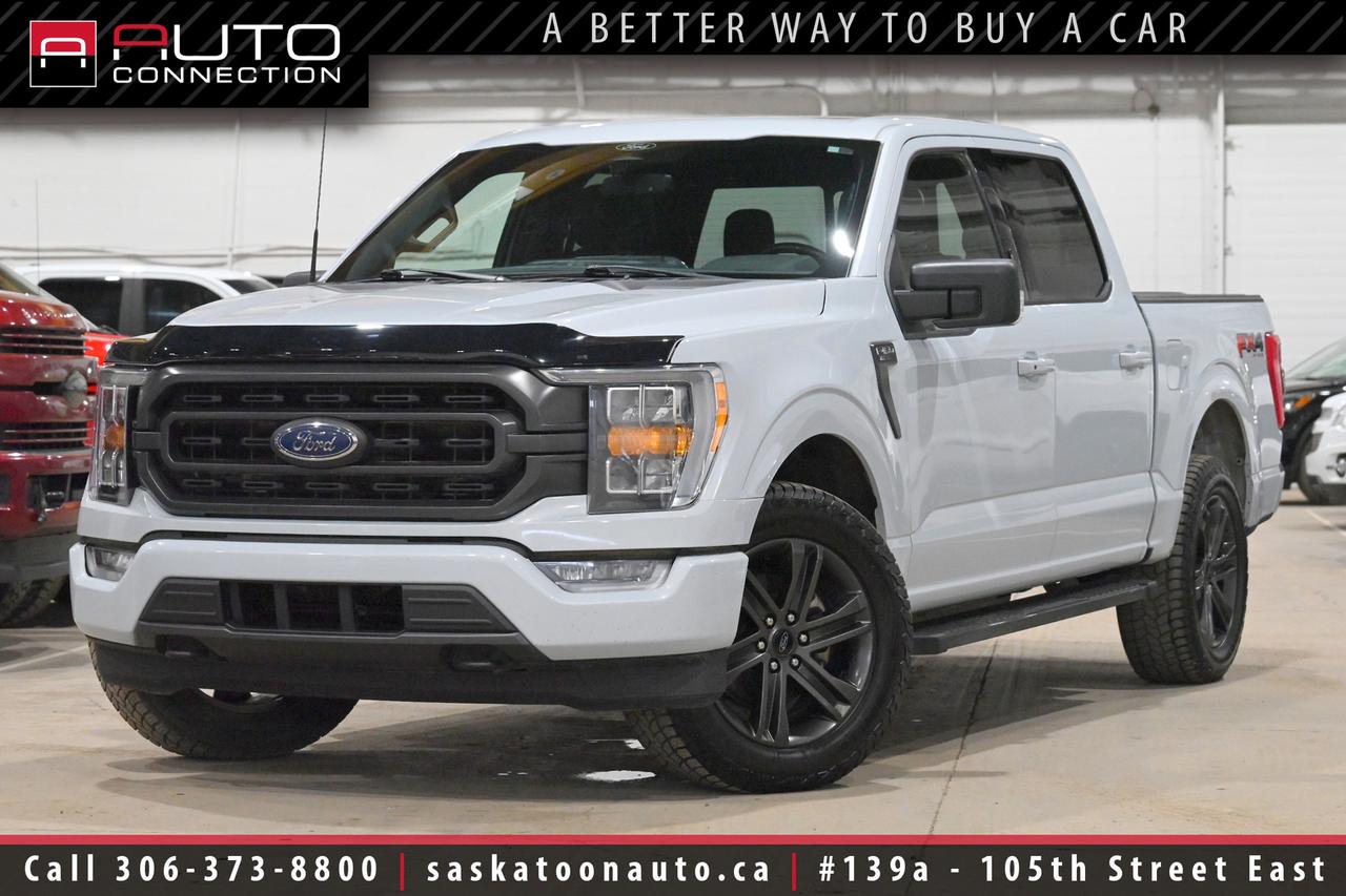 <p><span></span><font color=#000000><span><span>Financing & Warranty Available!</span><span><br></span></span></font><span><br></span><span>SuperCrew w/ 5.5ft. Box - SK Truck - Lots of Options!</span><span><br></span><span><br>Discover a capable and well-equipped <b>2022 Ford F-150 XLT Crew Cab</b> at Saskatoon Auto Connection that blends rugged capability with modern comfort. Powered by the 3.5L EcoBoost V6 and a 10-speed automatic, this 4x4 delivers confident towing and everyday smoothness - backed by an 11,300-lb towing capacity and an integrated trailer brake controller for heavy-duty jobs. Inside, the tech-forward cabin centers on a 12-inch capacitive touchscreen with Apple CarPlay and Android Auto, an 8-inch in-cluster productivity display, and a B&O premium sound system with subwoofer to make long drives effortless. Comfort is front and center with heated front bucket seats, dual-zone automatic climate control, a twin-panel moonroof that opens the sky above the prairie, and a leather-wrapped steering wheel for a refined feel. Smart, winter-ready touches like remote start, a power-sliding rear window with defroster, LED lighting, and a spray-in bedliner with LED box lighting mean this truck is ready for Saskatchewan seasons and weekend projects. Safety and trailer-focused systems - BLIS with trailer-tow coverage, cross-traffic alert, lane-keeping assist, pre-collision assist with automatic emergency braking, and a rear-view camera - give you confidence on busy roads and at the hitch. Practical work features such as the tailgate step with work surface, rear underseat storage, and an electronic locking differential with a 3.55 rear axle ratio make this F-150 as useful on the job site as it is comfortable on the highway. Finished in Space White Metallic with Black Sport Cloth, this XLT combines capability, tech, and comfort - stop by Saskatoon Auto Connection to see it in person and take it for a test drive.<br><br></span><span>Key Features:</span><span><br></span><span><br>- 4x4<br>- Equipment Group 302A<br>- XLT Sport Appearance Package<br>- FX4 Off-Road Package<br>- Heated Front Bucket Seats<br>- Remote Start<br>- Apple CarPlay & Android Auto Compatibility<br>- Twin-Panel Moonroof<br>- 12-Inch LCD Capacitive Touchscreen<br>- 8-Speaker B&O Premium Sound System w/ Subwoofer<br>- Reverse Sensing System<br>- Rear View Camera<br>- Blind Spot Information System (BLIS) w/ Trailer Tow Coverage<br>- Cross-Traffic Alert<br>- Lane-Keeping System w/ Driver Alert<br>- Pre-Collision Assist w/ Automatic Emergency Braking<br>- Pedestrian Detection<br>- Post-Collision Braking<br>- Forward Collision Warning<br>- Automatic High Beams<br>- 8-Inch In-Cluster Productivity Screen<br>- Dual-Zone Automatic Climate Control<br>- Intelligent Access w/ Push-Button Start<br>- Leather-Wrapped Steering Wheel<br>- Power-Sliding Rear Window w/ Defroster<br>- Rear Underseat Storage<br>- LED Reflector Headlamps<br>- LED Fog Lamps<br>- LED Box Lighting<br>- Spray-In Bedliner<br>- Tailgate Step w/ Work Surface<br>- Trailer Tow Package<br>- Integrated Trailer Brake Controller<br>- 11,300lb. Towing Capacity<br>- 3.55 Rear Axle Ratio<br>- Electronic Locking Differential<br>- 10-Speed Automatic Transmission<br>- 3.5L EcoBoost 6-Cylinder Engine<br><br><b>Exterior Colour:</b> Space White Metallic<br><b>Interior Colour:</b> Black Sport Cloth<br><br><b>Vehicle Specifications:</b> </span><a href=https://www.autotrader.ca/research/ford/f-150/2022/?srsltid=AfmBOoqPa2DS9LBl964BvijAm7nwCybi3zeFGoUs9JqPPulHBJzdQ9jX target=_blank><span>https://www.autotrader.ca/research/ford/f-150/2022/?srsltid=AfmBOoqPa2DS9LBl964BvijAm7nwCybi3zeFGoUs9JqPPulHBJzdQ9jX</span></a><span><br><br></span><span>Unlock a full year of exclusive VIP benefits with your purchase! Enjoy 20% off labour, 25% off tires, free windshield stone chip repairs, and so much more. Visit saskatoonauto.ca for all the details.<br></span><span><br>Honesty Pricing eliminates the haggle hassle by providing you with our lowest possible selling price up front. In fact, it is the lowest price in our market, and we will prove it by disclosing a comprehensive market report of what our competitors are selling similar vehicles for.<br></span><span><br>This vehicle meets our Diamond Certification standard, which begins by selecting only premium quality vehicles and subjecting them to a much more comprehensive inspection process than typical dealerships use. Diamond Certified ensures a clean history, exceptional appearance and problem-free operation.<br></span><span><br>At Saskatoon Auto Connection we sell pre-owned automobiles the way we would like to buy them ourselves. Since 2008, we have been dedicated to providing the highest level of integrity and transparency in our industry, in combination with the highest quality vehicles at the most competitive prices in Saskatchewan. Our friendly staff is ready to positively redefine your expectations of the pre-owned automobile space.</span><span></span></p>