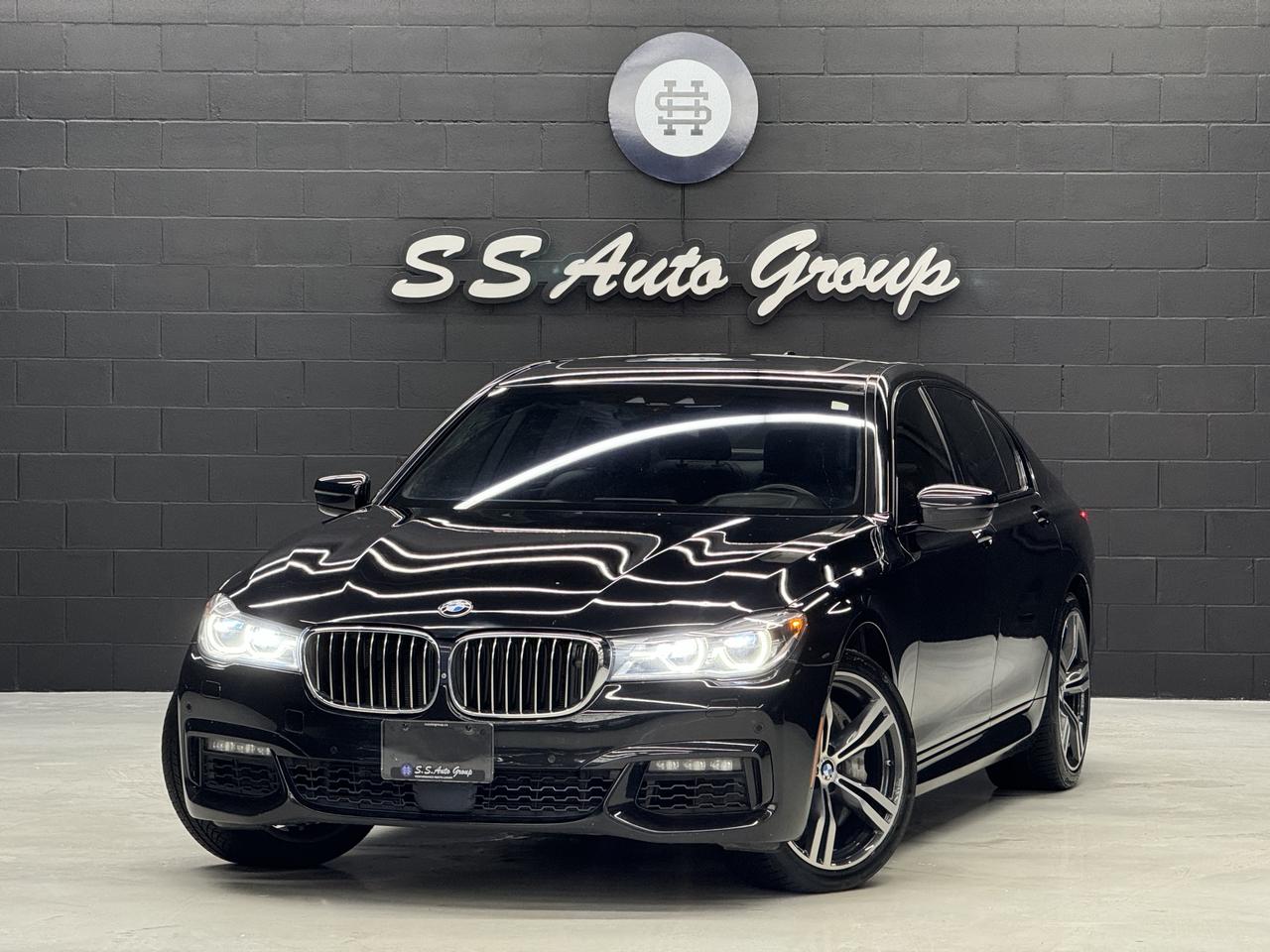 <p class=MsoNormal><span style=font-size: 9pt; line-height: 107%; color: rgb(0, 0, 0);>EXTENDED WARRANTY PACKAGES AVAILABLE UPTO 4 YEARS UNLIMITED KMS.&nbsp; ACCIDENT FREE VEHICLE WITH SERVICE RECORDS - CARFAX REPORT IS AVAILABLE UPON REQUEST.</span></p><p class=MsoNormal><span style=font-size: 9pt; line-height: 107%; color: rgb(0, 0, 0);>&nbsp;</span></p><p class=MsoNormal style=mso-margin-top-alt: auto; mso-margin-bottom-alt: auto; line-height: normal;><span style=font-size: 9pt; color: rgb(0, 0, 0); background-image: initial; background-position: initial; background-size: initial; background-repeat: initial; background-attachment: initial; background-origin: initial; background-clip: initial;>2017 BMW 750I M SPORT PACKAGE XDRIVE HAS LANDED.&nbsp;&nbsp;4.4L TURBOCHARGED V8 PRODUCING OVER 445HP AND 480LB/FT OF TORQUE.&nbsp; BLACK EXTERIOR ON BLACK INTERIOR.&nbsp; FULLY LOADED WITH NAVIGATION, BACKUP/360 CAMERA, 360 PARKING SENSORS, HEADSUP DISPLAY, ACTIVE BLINDSPOT ASSIST, LANE KEEP ASSIST, FRONT COLLISION ASSIST, NIGHT VISION, REAR TRAFFIC ASSIST, ADAPTIVE CRUISE CONTROL, HEATED SEATS, COOLED SEATS, MASSAGE SEATS, HEATED STEERING, HAMAN KARDON SOUND SYSTEM, POWER SUNROOF, REAR POWER SUNSHADES, INTERIOR AMBIENT LIGHTING, SOFT CLOSE DOORS, CARBON CORE, BMW DRIVE SELECT (ECO, COMFORT, SPORT, INDIVIDUAL), PREMIUM 20 INCH M SPORT WHEELS, PREMIUM ENHANCED PACKAGE, EXECUTIVE PACKAGE, ALCANTARA ROOF LINER, LASER LED HEADLIGHTS, PUSH BUTTON START, BLUETOOTH, KEYLESS COMFORT ACCESS AND MUCH MORE.&nbsp;&nbsp;</span></p><p class=MsoNormal style=mso-margin-top-alt: auto; mso-margin-bottom-alt: auto; line-height: normal;>&nbsp;</p><p class=MsoNormal><span style=color: rgb(0, 0, 0);><strong><span style=font-size: 9.0pt; line-height: 107%; mso-bidi-font-family: Calibri; mso-bidi-theme-font: minor-latin;>CERTIFICATION AVAILABLE FOR AN ADDITIONAL $999 &ndash;&nbsp;</span></strong><span style=font-size: 9.0pt; line-height: 107%; mso-bidi-font-family: Calibri; mso-bidi-theme-font: minor-latin;>IF NOT CERTIFIED AS PER OMVIC REGULATIONS THE VEHICLE IS DEEMED NOT DRIVABLE AND UNCERTIFIED.&nbsp;&nbsp;THIS FEE WILL ENSURE VEHICLE IS CERTIFIED AND ROAD WORTHY CONDITION. ADVERTISED PRICE EXCLUDES APPLICABLE TAXES, LICENSING, ADMINISTRATIVE, AND FINANCE FEES.</span></span></p><p class=MsoNormal><span style=font-size: 9pt; line-height: 107%; color: rgb(0, 0, 0);>&nbsp;</span></p><p class=MsoNormal><span style=font-size: 9pt; line-height: 107%; color: rgb(0, 0, 0);>OUR VEHICLES ARE PRICED TO SELL.&nbsp; DRIVE THIS HOME TODAY!&nbsp;&nbsp;CONTACT US FOR MORE DETAILS.</span></p><p class=MsoNormal><span style=font-size: 9pt; line-height: 107%; color: rgb(0, 0, 0);>&nbsp;</span></p><p class=MsoNormal><span style=font-size: 9pt; line-height: 107%; color: rgb(0, 0, 0);>S S AUTO GROUP INC.</span></p><p class=MsoNormal><span style=font-size: 9pt; line-height: 107%; color: rgb(0, 0, 0);>460 WOODY ROAD</span></p><p class=MsoNormal><span style=font-size: 9pt; line-height: 107%; color: rgb(0, 0, 0);>OAKVILLE, ONTARIO L6K 3T6</span></p><p class=MsoNormal><span style=font-size: 9pt; line-height: 107%; color: rgb(0, 0, 0);>&nbsp;</span></p><p class=MsoNormal><span style=font-size: 9pt; line-height: 107%; color: rgb(0, 0, 0);>CALL: (9 0 5) - 3 3 8 - 7 7 0 7</span></p><p class=MsoNormal><span style=font-size: 9pt; line-height: 107%; color: rgb(0, 0, 0);>TEXT: (6 4 7) - 8 8 6 - 8 1 8 2&nbsp; OR&nbsp; (6 4 7) - 5 2 3 - 0 0 6 9</span></p><p class=MsoNormal><span style=font-size: 9pt; line-height: 107%; color: rgb(0, 0, 0);>INSTAGRAM: @SSAUTOGROUP_</span></p>