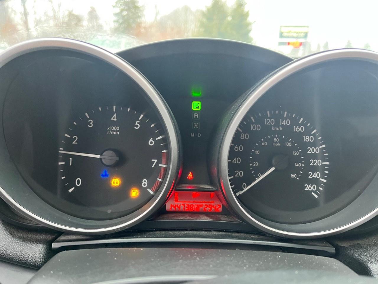 2011 Mazda MAZDA3 4dr Sdn Auto GX Photo