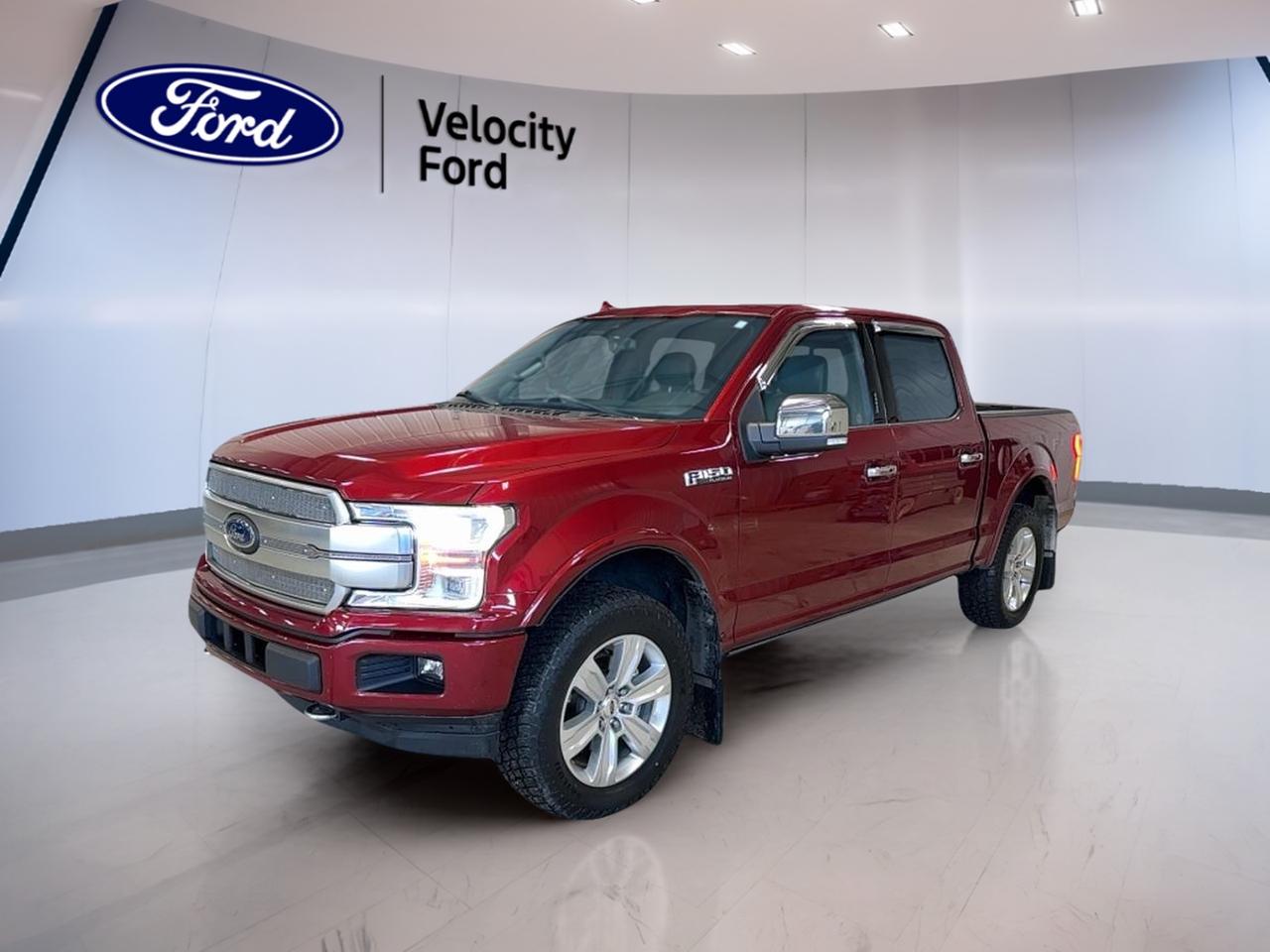 Take on workdays, weekends, and winter roads in Moose Jaw with this used 2019 Ford F-150 Platinum SuperCrew from Velocity Ford. Finished in red with a black interior and 4 full-size doors, it brings full-size truck comfort with premium-grade convenience. With its 3.5-litre gas engine and automatic transmission, its built to feel smooth, strong, and ready for real Saskatchewan driving.

This 2019 Ford F-150 Platinum SuperCrew is also well equipped for daily ease. Remote starter helps you get ahead of cold mornings, while push-button start keeps things simple when youre on the go. Inside, you get front air conditioning plus dual-zone climate control and automatic climate control to help keep everyone comfortable. Cruise control and power steering make highway runs calmer and more relaxed.

Confidence comes from smart safety and driver-assist features that help you stay aware in traffic and when backing into tight spots. This 2019 Ford F-150 Platinum SuperCrew includes a backup camera, blind spot monitor, anti-lock braking system, and stability control. With multiple airbags and child safety locks, its set up to support both family trips and work commutes.

For drivers who want tech that works without fuss, this 2019 Ford F-150 Platinum SuperCrew includes built-in navigation, Bluetooth integration, and a WiFi hotspot for connected travel. Satellite radio and HD Radio add more listening choice, and steering wheel audio controls help you keep your hands where they belong. Automatic headlights and LED headlamps add clear visibility when daylight fades.

TRUCK FEATURES  
»» Towing capacity rated at 4,580 kg  
»» Four-wheel drive for tough conditions  
»» Rear tow hook for recovery help  
»» Steps and power retractable running boards  

ADVANCED SAFETY FEATURES  
»» Anti-lock braking system for controlled stops  
»» Stability control helps maintain traction  
»» Blind spot monitor for lane changes  
»» Backup camera for easier reversing  

PERFORMANCE AND EFFICIENCY  
»» 3.5-litre gas engine for strong pull  
»» Automatic transmission with dual shift mode  
»» Four-wheel drive for year-round capability  
»» Power steering for lighter low-speed control  

COMFORT AND CONVENIENCE  
»» Dual-zone climate control for personalized comfort  
»» Heated front and heated rear seats  
»» Memory seats and adjustable pedals  
»» Remote starter and push-button start  

TECHNONOLGY AND CONNECTIVITY  
»» Navigation system for clear route guidance  
»» Bluetooth integration for hands-free calling  
»» WiFi hotspot for connected passengers  
»» Satellite radio and HD Radio  

CARGO SPACE  
»» Four full-size doors for easy loading  
»» Rear trunk access for added practicality  
»» Steps help reach cabin and gear  
»» Spare tire carried for roadside needs  

WHAT OTHER OWNERS LIKE  
»» Strong towing feel with confident power  
»» Comfortable ride for long highway drives  
»» Useful tech like navigation and Bluetooth  
»» Four-wheel drive confidence in winter  

This 2019 Ford F-150 Platinum SuperCrews VIN is: 1FTEW1E49KFC70740.