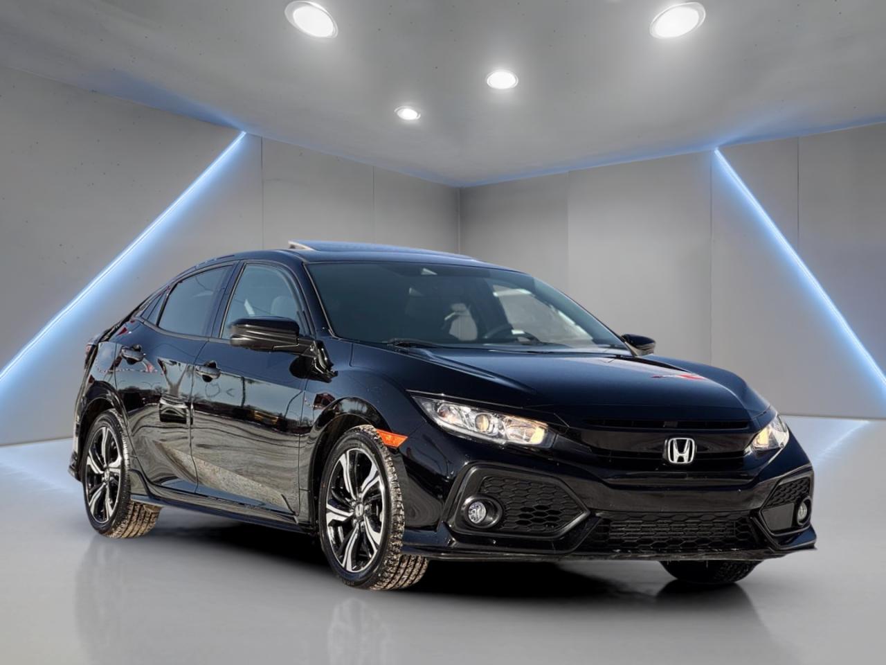 All Trades Accepted. In-house Financing Available. Flexible Payments and Zero Down Financing. All Credit Situations Accepted O.A.C

// ACCIDENT FREE!! //  
// SINGLE OWNER! //  
// EXCELLENT CONDITION! //  

Meet a smart, sporty daily driver that fits Saskatoon life with ease. This used 2019 Honda Civic Sport CVT Hatchback delivers a fun feel, efficient 1.5 L gas power, and the confidence of an automatic transmission. Finished in black on black, it looks clean and sharp. With 27,531 km, its nicely kept and ready for more kilometres.

This 2019 Honda Civic Sport CVT Hatchback brings the Sport package attitude with a sleek rear spoiler and performance tires that help it feel planted. The sunroof adds fresh air and light, while the cabin layout keeps key controls close at hand. With 4 doors, its easy to load friends, family, or gear without the tight feel of a small car.

FEATURES OF THE Civic Sport CVT Hatchback Sport  
»» Sport package with rear spoiler styling  
»» Sunroof for light and airflow  
»» Leather steering wheel for better grip  
»» Dual shift mode for manual control  

ADVANCED SAFETY FEATURES  
»» Anti-lock braking system for controlled stops  
»» Stability control helps in poor conditions  
»» Side impact airbags for added protection  
»» Backup camera for easier reversing  

PERFORMANCE AND EFFICIENCY  
»» 1.5 L gas engine for balance  
»» Automatic transmission with smooth CVT operation  
»» Front-wheel drive for predictable handling  
»» Dual shift mode for driver control  

COMFORT AND CONVENIENCE  
»» Heated front seats for cold mornings  
»» Dual-zone climate control for shared comfort  
»» Power windows for quick adjustments  
»» Cruise control for relaxed highway drives  

TECHNONOLGY AND CONNECTIVITY  
»» Bluetooth integration for calls and audio  
»» Steering wheel audio controls reduce distraction  
»» Push button start for quick getaways  
»» Automatic headlights for added convenience  

CARGO SPACE  
»» Hatchback design makes loading simple  
»» Cargo cover helps keep items hidden  
»» Rear trunk access for daily practicality  
»» Spare tire included for peace of mind  

WHAT OTHER OWNERS LIKE  
»» Easy-to-use controls and clear layout  
»» Strong everyday power from 1.5 L  
»» Hatchback versatility for errands and trips  
»» Confident feel with safety tech  

WARRANTY  
Additional warranty information: PRE-OWNED VEHICLE EXTENDED WARRANTY & INSURANCE

At Platinum Auto Sport in Saskatoon, we provide comprehensive pre-owned vehicle extended warranty coverage to ensure your peace of mind. Powered by SAL Warranty, our services include protection against mechanical breakdowns and extended manufacturer warranty coverage, including bumper-to-bumper. We also offer Guaranteed Auto Protection (GAP Insurance) and Credit Insurance (CAP Insurance). Learn more about our services at IA SAL https://iadealerservices.ca/insurance-and-warranty.

Our services include:

Creditor Group Insurance

Extended Warranty

Replacement Insurance and Warranty

Appearance Protection

Traceable Theft Deterrent

Guaranteed Asset Protection

Original Equipment Manufacturer (OEM) Programs

Choose Platinum Auto Sport for reliable pre-owned vehicle warranties and protection plans in Saskatoon. We ensure you drive with confidence, knowing your investment is secure.

Looking for used car financing in Saskatoon GET PRE APPROVED ONLINE TODAY!

IN HOUSE FINANCING AVAILABLE

Over 25 lending partners on site

In House Financing https://www.platinumautosport.com/financing

Free Delivery anywhere in Western Canada

Full Vehicle History Disclosure

Dealer Exclusive Financing Incentives (O.A.C)

We Take anything on Trade u0013 Powersports, Boats, RV.

This vehicle qualifies for Special Low % Financing

PLATINUM AUTO SPORT in Saskatoon. Call or Text Fernando (639) 471-1839 (General Manager) www.platinumautosport.com

Conditions Apply. Contact Dealer for Details.

Looking for the best selection of quality used cars in Saskatoon Look no further than Platinum Auto Sport! Our extensive inventory features a diverse range of meticulously inspected vehicles, ensuring you get the reliable and safe ride you deserve. At Platinum Auto Sport, we believe in transparent and fair pricing. Our competitive prices reflect the true value of our vehicles, giving you peace of mind that youre making a smart investment. What sets us apart is our dedicated team of automotive experts. With years of experience, theyre passionate about helping you find the perfect vehicle that fits your lifestyle and budget. Plus, we work with a network of trusted lenders to provide you with flexible financing options. We take pride in our commitment to customer satisfaction. Our service doesnt end after the sale. Were here to support you with any questions or concerns, ensuring you have a seamless ownership experience. Located right here in Saskatoon, we understand the unique needs of the local community. Our deep knowledge of the market allows us to provide you with the best possible service. Visit us today in Saskatoon, SK and experience the Platinum Auto Sport difference for yourself. Drive away in a vehicle youll love, knowing you made the right choice with Platinum Auto Sport!

This 2019 Honda Civic Sport CVT Hatchbacks VIN is: SHHFK7H47KU302070.