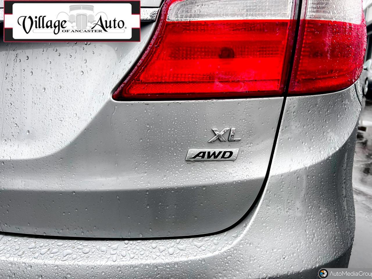 2014 Hyundai Santa Fe XL AWD 4dr 3.3L Auto Premium Photo