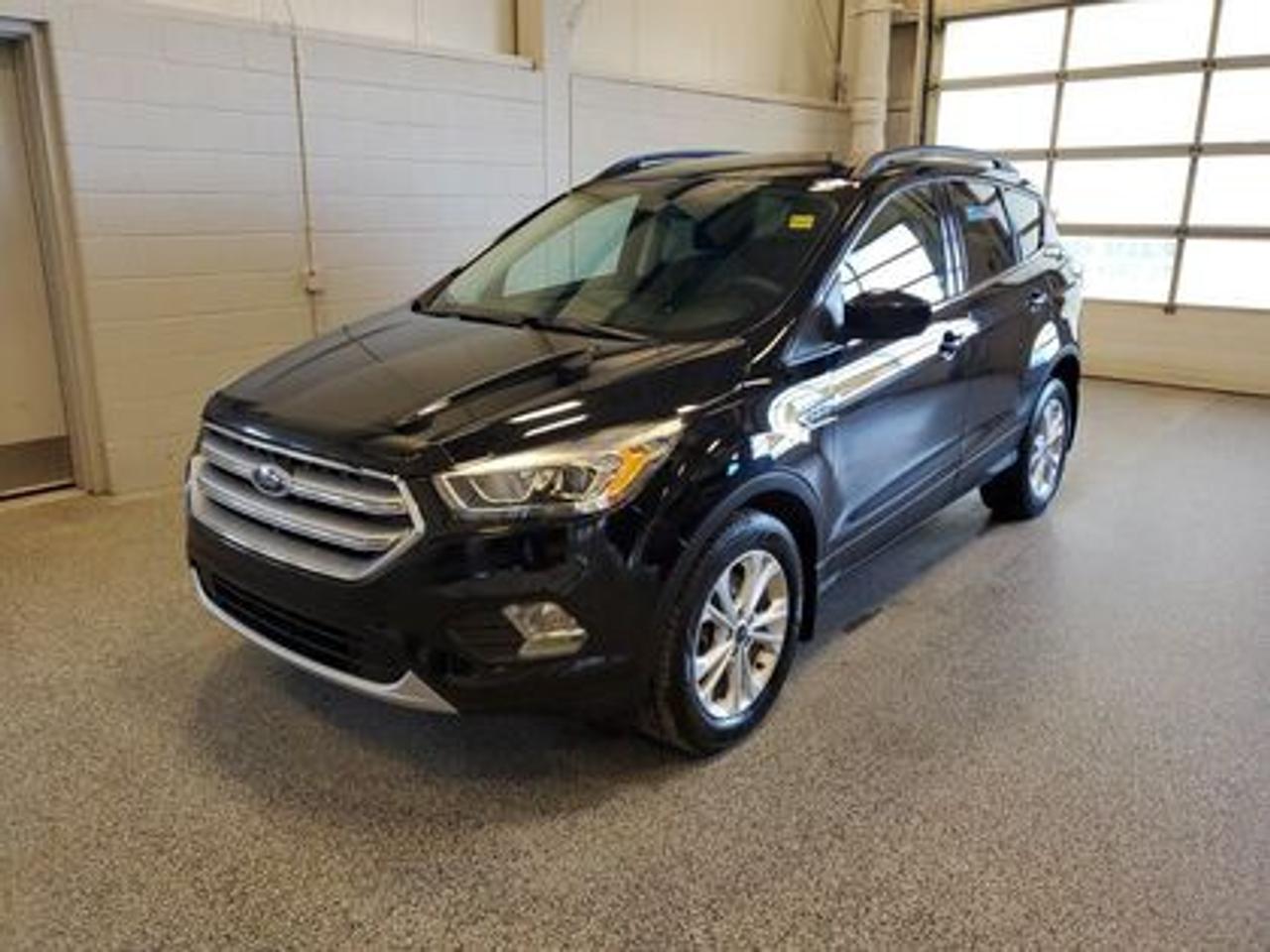 READY FOR ANY ROAD!!  Check out this 2017 Ford Escape SE 201A 4WD, powered by the efficient and responsive 1.5L EcoBoost. Four-wheel drive confidence for our winters, turbocharged pep for the daily commute, and the versatility that makes Escape a fan favorite. Practical. Peppy. Priced to move.

Key Features:
Cloth Seats
Heated Seats 
Power Driver Seat
SYNC
Bluetooth
Cruise Control
Back Up Sensors
Back Up Camera 
Key Pad Entry
Auto Start Stop
Remote Keyless Entry

After this vehicle came in on trade, we had our fully certified Pre-Owned Ford mechanic perform a mechanical inspection. This vehicle passed the certification with flying colors. After the mechanical inspection and work was finished, we did a complete detail including sterilization and carpet shampoo. 

Moose Jaw Ford, conveniently located at 1010 North Service Road in Moose Jaw, is your trusted destination for all your automotive needs. With an impressive 4.8-star Google rating from nearly 1,500 reviews, we are proud to deliver an exceptional vehicle-buying experience tailored just for you. Our Moose Jaw Motives set us apart, offering unbeatable value like half-priced oil changes for life on pre-owned vehicles, one year of key and remote protection, and one year of tire and rim protection. Enjoy peace of mind with every purchase. At Moose Jaw Ford, were committed to driving positive change in our community by combining exceptional service, high-quality vehicles, and a guest-first approach. Visit us today!