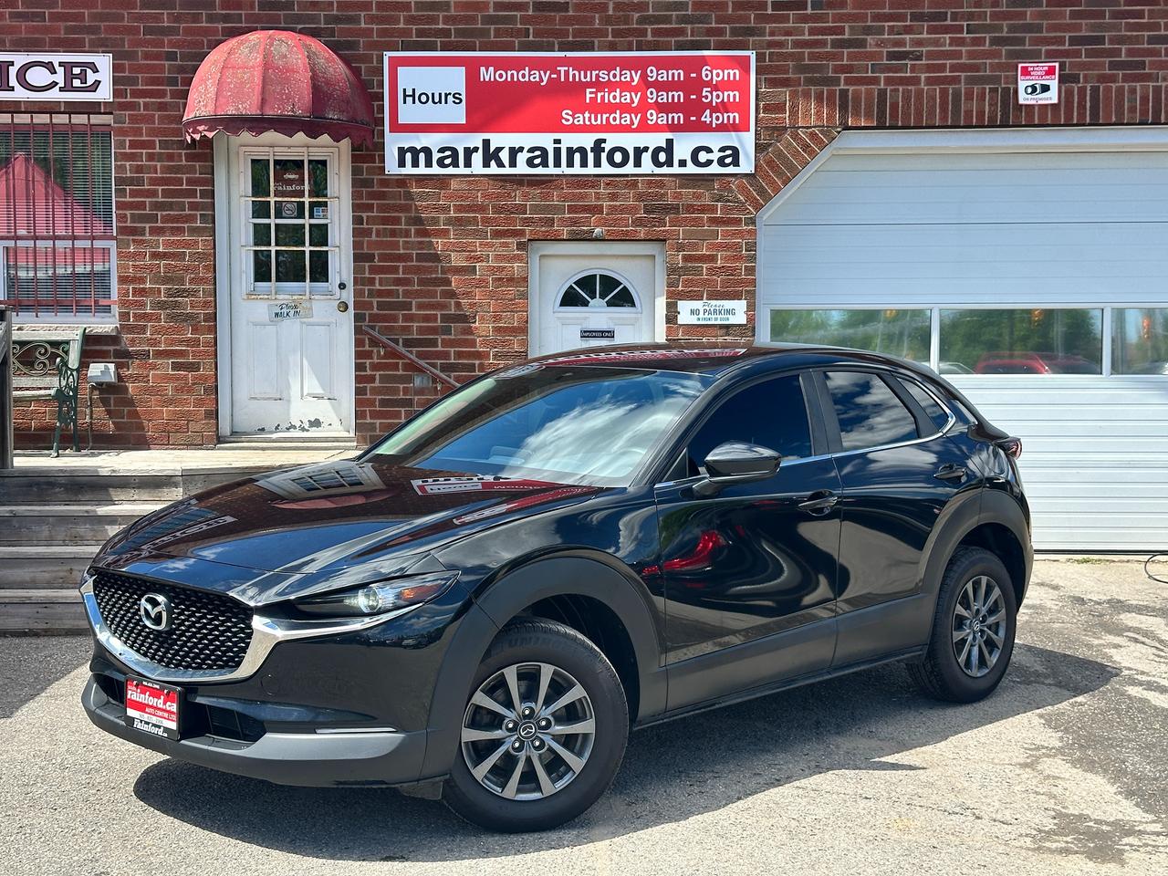 <p>Super-Clean Mazda CX-30 from St. Isidore, ON! This GX AWD model looks sharp in its Black paint and dark factory alloy wheels, with nice options inside and out! The exterior features keyless entry, automatic headlights, colour-matched side mirrors, chromed accents, a sleek rear spoiler, tinted privacy glass, a sporty dual exhaust, blind spot monitors, and cross traffic alert, a set of gorgeous dark factory alloy wheels, a peppy fuel-efficient 2.0L 4-Cylinder Engine and Automatic transmission powering the All-Wheel-Drive system! The interior is clean and comfortable with heated cloth front seats, power door locks, windows and mirrors, drivers lumbar control, a sharp-looking Black/Blue interior, a large cargo area, steering wheel Audio and Cruise controls, automatic wiper blades, an easy-to-read and use gauge cluster, push button start, central AM/FM HD Radio with Bluetooth, Apple CarPlay, Android Auto, Backup Camera and Navigation Capabilities, A/C climate control with front and rear window defrost settings, Auto Hold Brake Setting, Sport Driving mode, USB/12V accessory ports and more!</p><p>&nbsp;</p><p>Carfax Claims Free!</p><p>&nbsp;</p><p>Call (905) 623-2906</p><p>&nbsp;</p><p>Text Ryan: (905) 429-9680 or email: ryan@markrainford.ca</p><p>&nbsp;</p><p>Text Mark: (905) 431-0966 or email: mark@markrainford.ca</p>
