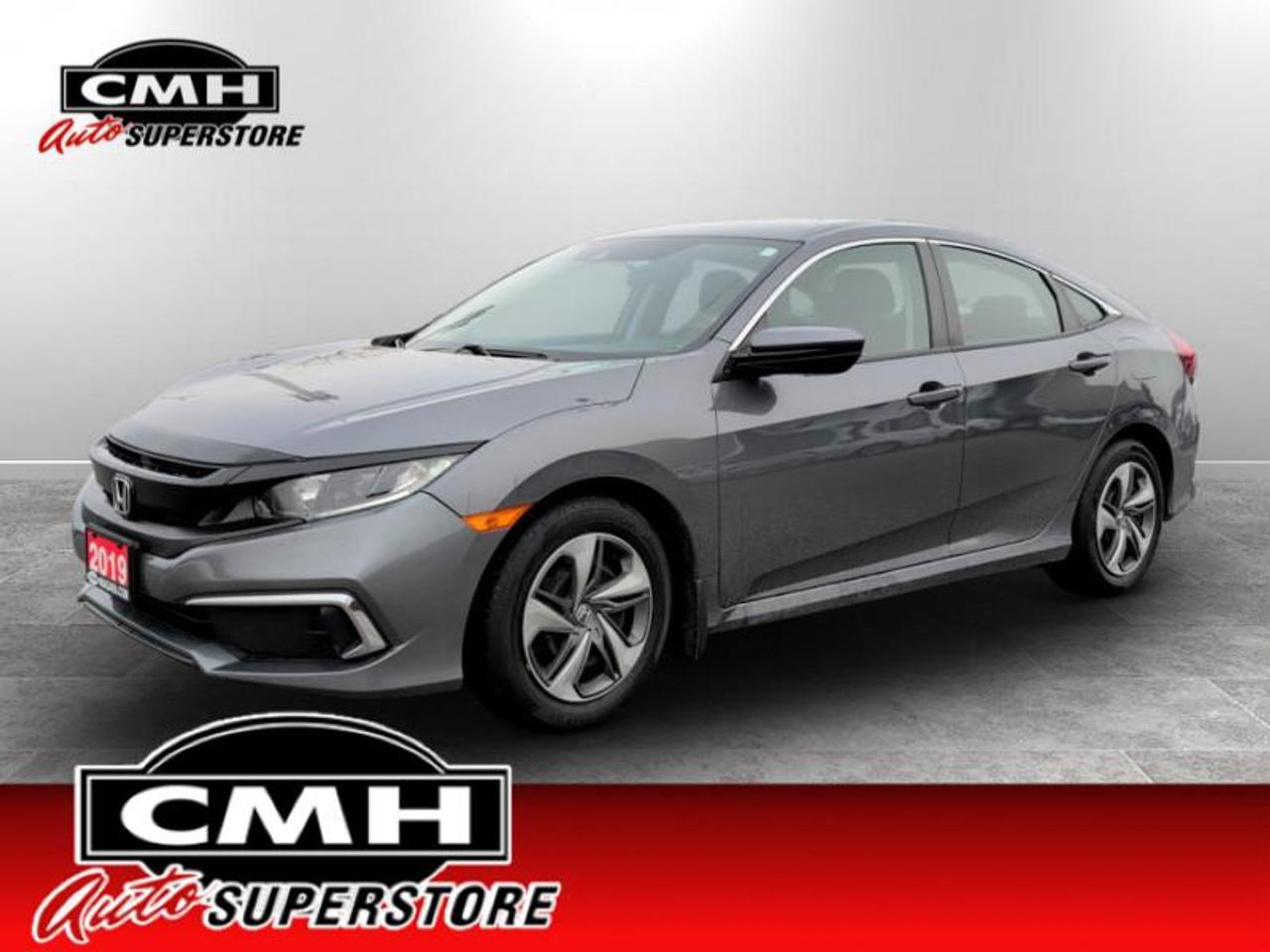 <b>ONLY 53,000 KMS !! GREAT SERVICE HISTORY !! REAR CAMERA, ADAPTIVE CRUISE CONTROL, LANE ASSIST, COLLISION SENSORS, APPLE CARPLAY, ANDROID AUTO, BLUETOOTH, STEERING WHEEL CONTROLS, HEATED FRONT SEATS, CLIMATE CONTROL, 16-IN STEEL WHEELS W/PLASTIC COVERS</b><br>  <br>CMH certifies that all vehicles meet DOUBLE the Ministry standards for Brakes and Tires. The advertised price is the promotional financing price. For all other methods of payment, the selling price is $500 higher.<br><br> <br>This 2019 Honda Civic Sedan is for sale today. <br> <br>With harmonious power, excellent handling capability, plus its engaging driving dynamic, this 2019 Honda Civic is a highly compelling choice in the eco-friendly compact car segment. Regardless of your style preference or driving habits, this impressive Honda Civic will perfectly suit your wants and needs. The Civic offers the right amount of cargo space, an aggressive exterior design with sporty and sleek body lines, plus a comfortable and ergonomic interior layout that works well with all family sizes. This Civic easily makes a bold statement without saying a word! This low mileage sedan has just 52,160 km. Its Grey in colour. It has an Automatic transmission and is powered by a 158HP 2.0L 4 Cylinder Engine. <br> <br> Our Civic Sedans trim level is LX. This LX Civic still packs a lot of features for an incredible value with driver assistance technology like collision mitigation with forward collision warning, lane keep assist with road departure mitigation, adaptive cruise control, straight driving assist for slopes, and automatic highbeams you normally only expect with a higher price. The interior is as comfy and advanced as you need with heated front seats, remote keyless entry, Apple CarPlay, Android Auto, Bluetooth, Siri EyesFree, WiFi tethering, steering wheel with cruise and audio controls, multi-angle rearview camera, 7 inch driver information display, and automatic climate control. The exterior has some great style with a refreshed grille, independent suspension, heated power side mirrors, and LED taillamps.<br> <br>To apply right now for financing use this link: <a href=https://www.cmhniagara.com/financing/ target=_blank>https://www.cmhniagara.com/financing/</a><br><br> <br/><br>**PLEASE NOTE:** The functionality and condition of any accessories and aftermarket parts are not guaranteed by CMH Auto Superstore. Examples of such items include, but are not limited to: tonneau covers, radios, cameras, remote starts, vent visors, roof racks, winches, light bars, headlights/tail lights, center caps, running boards, etc. If an aftermarket part is safety-related and found to be defective, it will be replaced by a factory option.<br><b>**CMH Auto Superstore reserves the right to choose to repair, modify, or replace all aftermarket parts (example  headlights) or accessories at its sole discretion.**</b><br><br>Trade-ins are welcome! Financing available OAC ! Price INCLUDES a valid safety certificate! Price INCLUDES a 60-day limited warranty on all vehicles except classic or vintage cars. CMH is a Full Disclosure dealer with no hidden fees. We are a family-owned and operated business for over 30 years! o~o