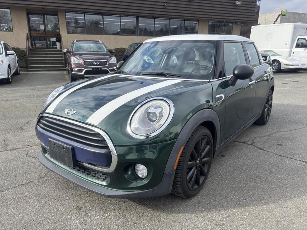 2016 Mini Cooper 4-Door, 1.6L, 4 cylinder,  automatic, FWD, 4-Wheel ABS, cruise control, AM/FM radio, navigation aid, power windows, power mirrors, green exterior, , leather.  $11,710.00 plus $375 processing fee, $12,085.00 total payment obligation before taxes.  Listing report, warranty, contract commitment cancellation fee, financing available on approved credit (some limitations and exceptions may apply). All above specifications and information is considered to be accurate but is not guaranteed and no opinion or advice is given as to whether this item should be purchased. We do not allow test drives due to theft, fraud, acts of vandalism and undetectable impaired driving. Instead we provide the following benefits: Complimentary Warranty (with options to extend), Limited Money Back Satisfaction Guarantee on Fully Completed Contracts, Contract Commitment Cancellation, and an Open-Ended Sell-Back Option. Ask seller for details or call 604-522-REPO(7376) to confirm listing availability.