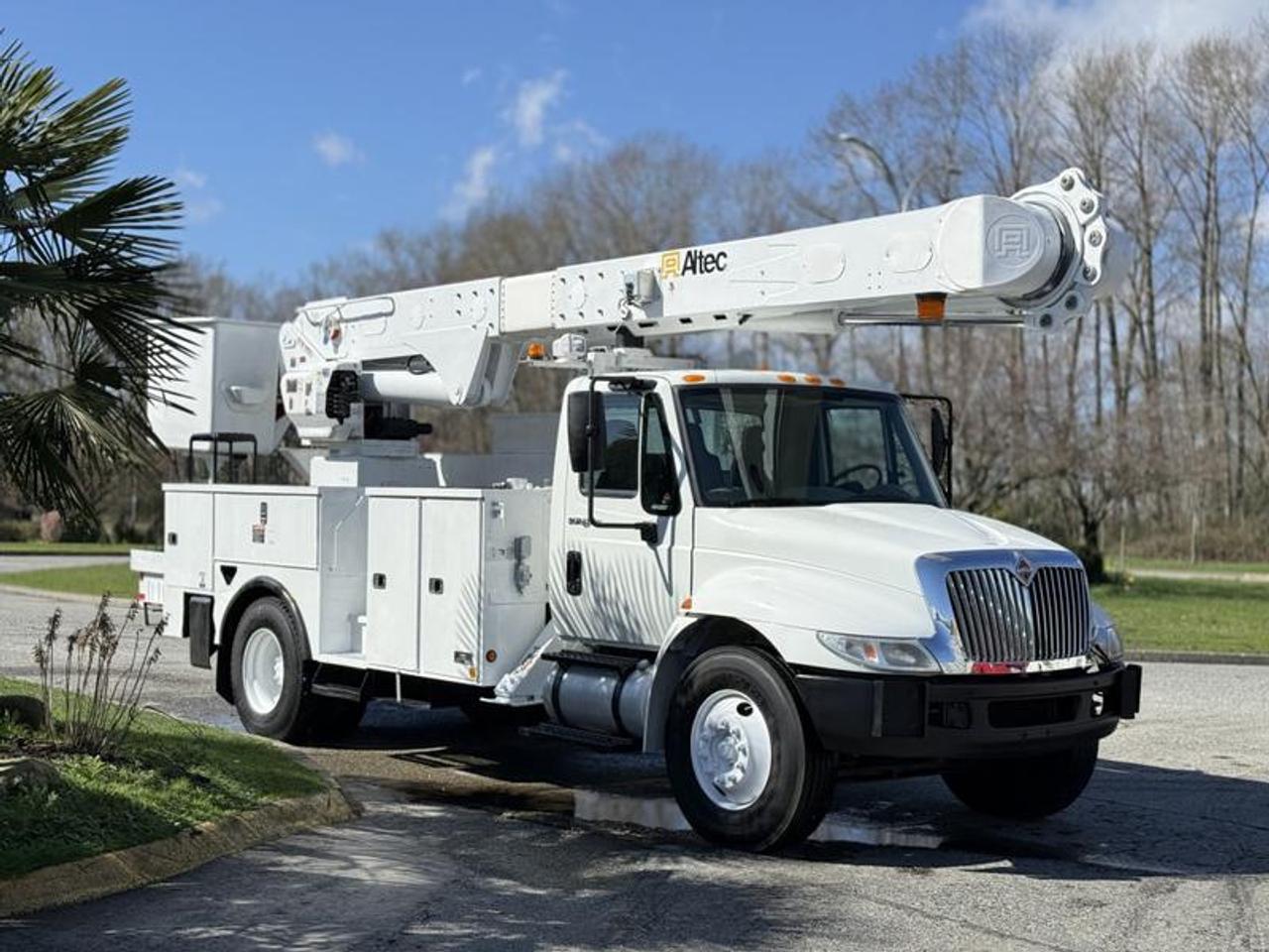 This 2011 International 4300 bucket truck is powered by a 7.6L inline-6 diesel paired with an automatic transmission and 4x2 drivetrain, and is equipped with air brakes for commercial operation. It features an Altec AM55E bucket (S#0310DM2801) offering a 56-foot platform height with a 600 lb capacity, along with outriggers for added stability and a pintle trailer hitch for towing capability. Additional equipment includes cruise control, air conditioning, and an AM/FM radio, finished in white with a grey vinyl interior. Overall dimensions are approximately 11 feet 7 inches high and 35 feet long, making it well suited for utility, electrical, or fleet applications. This item is currently OFFSITE. You must register an appointment with our office to schedule an offsite viewing. Appointments must be made a minimum of one business day in advance (and as defined by the days that Repo.com is open for business) before your appointment can be scheduled and confirmed. We may, at our own discretion, instead opt to transport smaller items to Repo.coms main yard for viewing purposes.  $39,840.00 plus $375 processing fee, $40,215.00 total payment obligation before taxes.   Listing report, warranty, contract commitment cancellation fee, financing available on approved credit (some limitations and exceptions may apply). All above specifications and information is considered to be accurate but is not guaranteed and no opinion or advice is given as to whether this item should be purchased. We do not allow test drives due to theft, fraud, acts of vandalism and undetectable impaired driving. Instead we provide the following benefits: Complimentary Warranty (with options to extend), Limited Money Back Satisfaction Guarantee on Fully Completed Contracts, Contract Commitment Cancellation, and an Open-Ended Sell-Back Option. Ask seller for details or call 604-522-REPO(7376) to confirm listing availability.