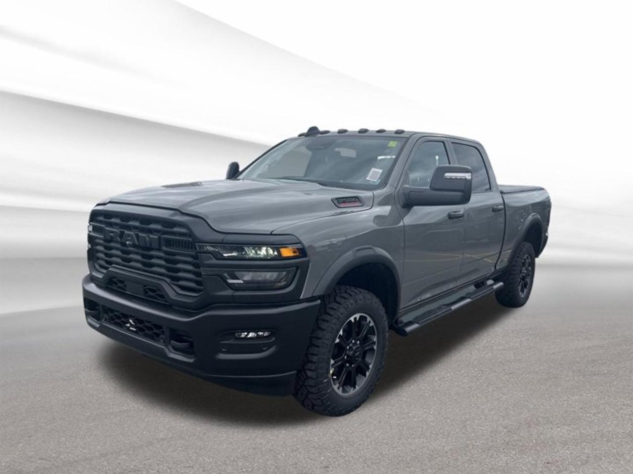 Meet the brand new 2026 RAM 2500 Warlock, now available at Steele Halifax Chrysler Dodge Jeep Ram FIAT in Halifax. Finished in Grey with a Black interior, this heavy-duty truck is built for drivers who want serious capability with a clean, confident look. With 4 doors and an automatic transmission, the 2026 RAM 2500 Warlock is ready for workdays, weekends, and everything in between.Under the hood, the 2026 RAM 2500 Warlock is powered by a 6.4 L/392 Regular Unleaded V-8 gas engine. This is the kind of powertrain chosen for strong low-end pull, steady power delivery, and the kind of response you want when the truck is loaded up. Add in 4-wheel drive, and you have the traction and control to handle changing Halifax weather, rough job sites, and unpaved roads with more confidence.This truck also comes equipped with practical features that make daily driving easier. Steps help you get in and out of the cab with less effort, especially useful on a truck with a tall ride height. Mirrors are included to support visibility around the vehicle, whether you are backing into a spot or lining up at the curb. Inside, the auto-dimming rearview mirror reduces glare from headlights behind you, helping you stay more comfortable on night drives.TRUCK FEATURES6.4 L V-8 gas power4-wheel drive for added tractionFour-door cab for easier accessAutomatic transmission for smooth operationADVANCED SAFETY FEATURESMirrors help improve outward visibilityAuto-dimming mirror reduces night glareFour-wheel drive aids control on slick roadsStable heavy-duty stance inspires confident handlingPERFORMANCE AND EFFICIENCY6.4 L V-8 gas engineAutomatic transmission for consistent power delivery4-wheel drive for tough conditionsBuilt for heavy-duty everyday useCOMFORT AND CONVENIENCEFour doors for easier passenger entrySteps make cab access more convenientAuto-dimming mirror eases night drivingPractical layout for daily truck lifeTECHNONOLGY AND CONNECTIVITYClear mirror view supports daily awarenessAuto-dimming mirror adapts to lightingSimple controls keep focus on drivingBuilt for straightforward, reliable operationCARGO SPACEPickup bed supports work and weekend loadsFour-door cab adds secure interior storageSteps help reach into bed easierHeavy-duty build suits demanding hauling tasksWHAT OTHER OWNERS LIKEStrong V-8 power for real work4-wheel drive confidence in bad weatherEasy entry with helpful side stepsReduced glare from auto-dimming mirrorThis 2026 RAM 2500 Warlocks VIN is: 3C6UR5CJ4TG260451.We invite you to book a viewing and test drive at your earliest convenience