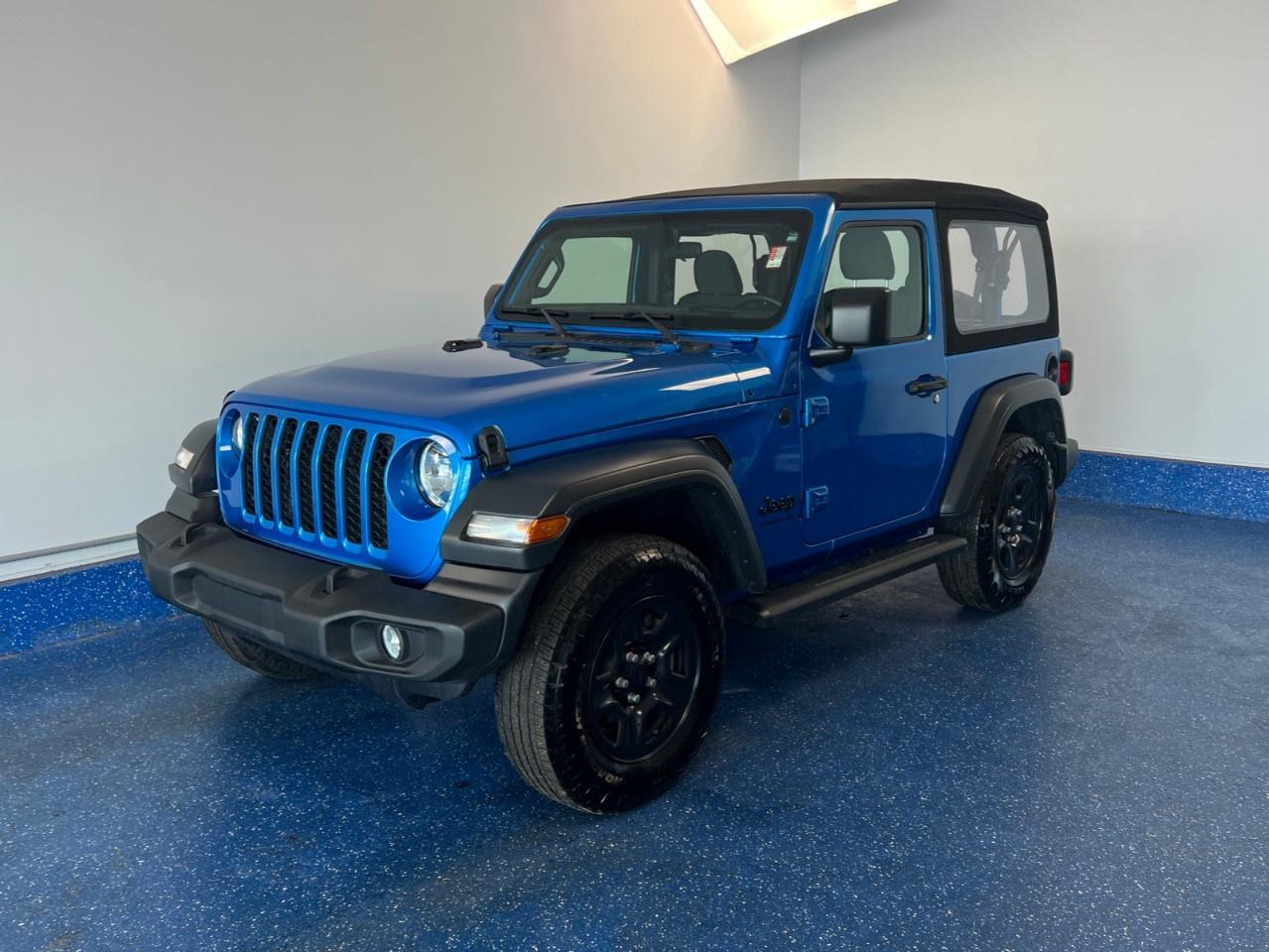Recent Arrival! 2024 Jeep Wrangler Sport Sport | Offlease | One Owner | Low Kms | Zacks Certified. 8-Speed Automatic 4WD Hydro Blue Pearl Coat 2.0L I4 DOHC<br /><br /><br />Dealer Maintained, Air Conditioning, Front Bucket Seats, Front fog lights, Power steering, Quick Order Package 22B Sport (DISC), Radio: Uconnect 5W w/12.3''' Display, Steering wheel mounted audio controls, Tilt steering wheel, Trailer Tow & HD Electrical Group.<br /><br />Certification Program Details: Fresh 2 Yr MVI | 30 day warranty* | 110 point inspection | Full tank of fuel | Krown rustproofed | Flexible financing options | Professionally detailed<br /><br />This vehicle is Zacks Certified! You're approved! We work with you. Together we'll find a solution that makes sense for your individual situation. Please visit us or call 902 843-3900 to learn about our great selection.<br /><br />With 22 lenders available Zack's Auto Sales can offer our customers with the lowest available interest rate. Thank you for taking the time to check out our selection!