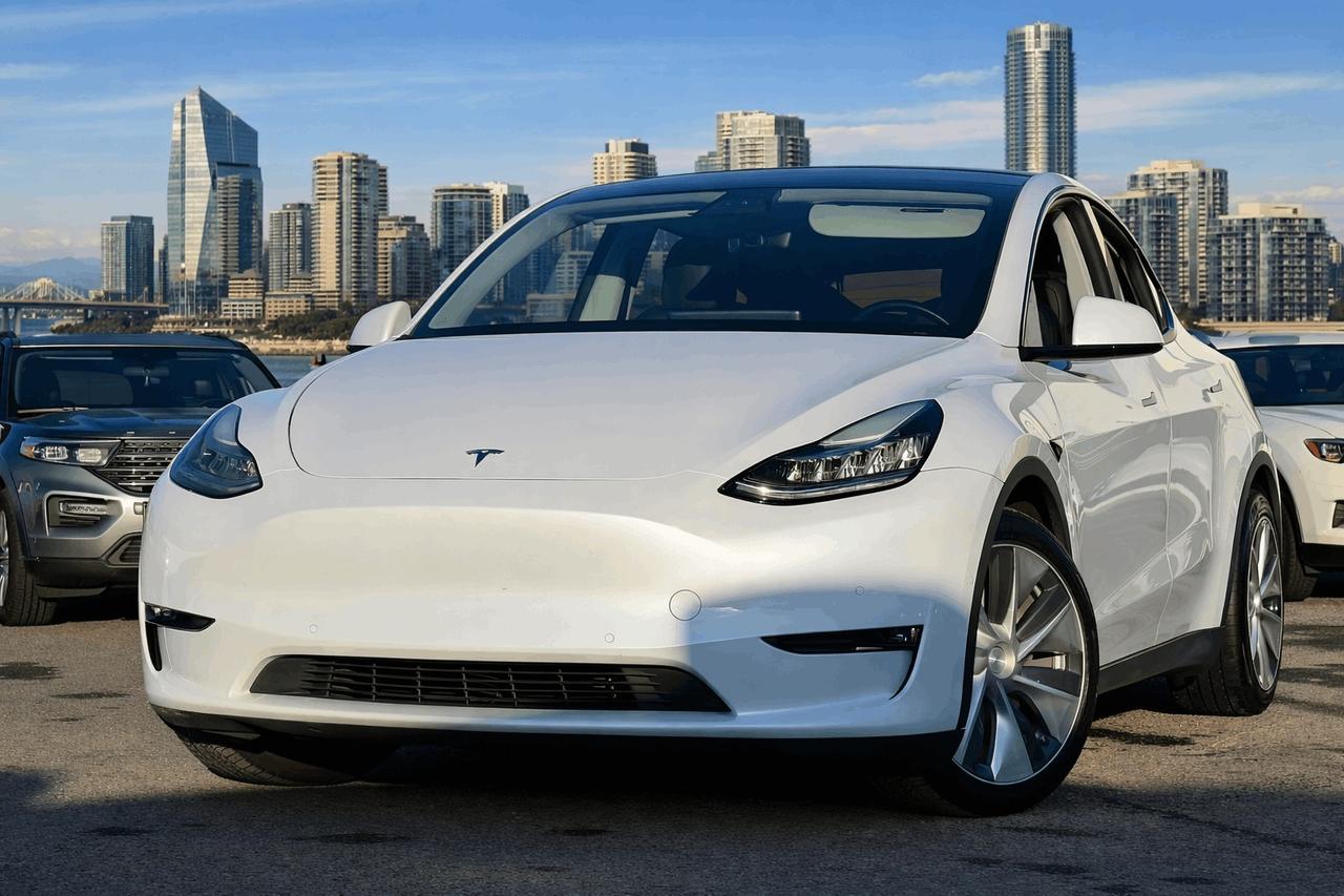<p></p><p><strong>2021&nbsp;Tesla Model Y LONG RANGE AWD</strong></p><p>TRUE PRICE, NO HIDDEN FEE, FREE CARFAX, FULL INSPECTION REPORT</p><p>CLEAN TITLE, BC LOCAL, ACCELERATION BOOST</p><p><br></p><p><strong><strong><strong><span>Highlight Feature:</span></strong></strong></strong></p><p><strong><strong><strong><span>- Navigation System</span></strong></strong></strong></p><p><strong><strong><strong><span>- Back-up Camera&nbsp;</span></strong></strong></strong></p><p><strong><strong><strong><span>- Blind-Spot Camera</span></strong></strong></strong></p><p><strong><strong><strong><span>- Panoramic Sunroof</span></strong></strong></strong></p><p><strong><strong><strong><span>- Heated Seats</span></strong></strong></strong></p><p><strong><strong><strong><span>- Rear Heated Seats</span></strong></strong></strong></p><p><strong><strong><strong><span>-Keyless Entry</span></strong></strong></strong></p><p><strong><strong><strong><span>-Auto High-Beam Headlight</span></strong></strong></strong></p><p><strong><strong><strong><span>- Autopilot</span></strong></strong></strong></p><p><strong><strong><strong><span>- Pre-Collision Safety System</span></strong></strong></strong></p><p><strong><strong><strong><span>- FM/AM Radio</span></strong></strong></strong></p><p><strong><strong><strong><span>- Bluetooth Technology&nbsp;</span></strong></strong></strong></p><p><strong><strong><strong><span>- AND MUCH MORE</span></strong></strong></strong></p><p><br></p><p><br></p><p>Although every attempt is made to ensure the accuracy of the data above, due to the possibility of human error, we cannot guarantee the accuracy of the displayed information, the availability of this vehicle, or the accuracy of its photo or stock photo. Such information may not reflect exact vehicle color, trim, options, price or other specifications.<br></p><p><br></p><br><p><br></p><p><strong><strong><strong><strong><strong><strong><span>*** FULL CARFAX REPORT AND INSPECTION PAPER AVAILABLE!!***</span></strong></strong></strong></strong></strong></strong></p><p><strong><strong><strong><span>*** BEST VALUE FOR YOUR TRADE-IN OR SELL US YOUR CARS!!***</span></strong></strong></strong></p><p><strong><strong><strong><span>*** COMPETITIVE RATE FOR FINANCING!!***</span></strong></strong></strong></p><p><strong><strong><strong><span><br></span></strong></strong></strong></p><p><strong><strong><strong><strong>DL#40299 UC Auto</strong></strong></strong></strong><br></p><p><strong><strong><strong><span>3891 No 3 Rd, Richmond, BC V6X 2B8</span></strong></strong></strong></p><p><span>*All price excludes $995 Doc Fee& $995Vehicle Preparation Fee,<span>&nbsp;</span>applicable taxes.*</span></p><p><br></p><p><strong><span>*Finance and Lease option available on vehicle year 2014<span>&nbsp;</span>or newer*</span></strong></p><br><p></p>
