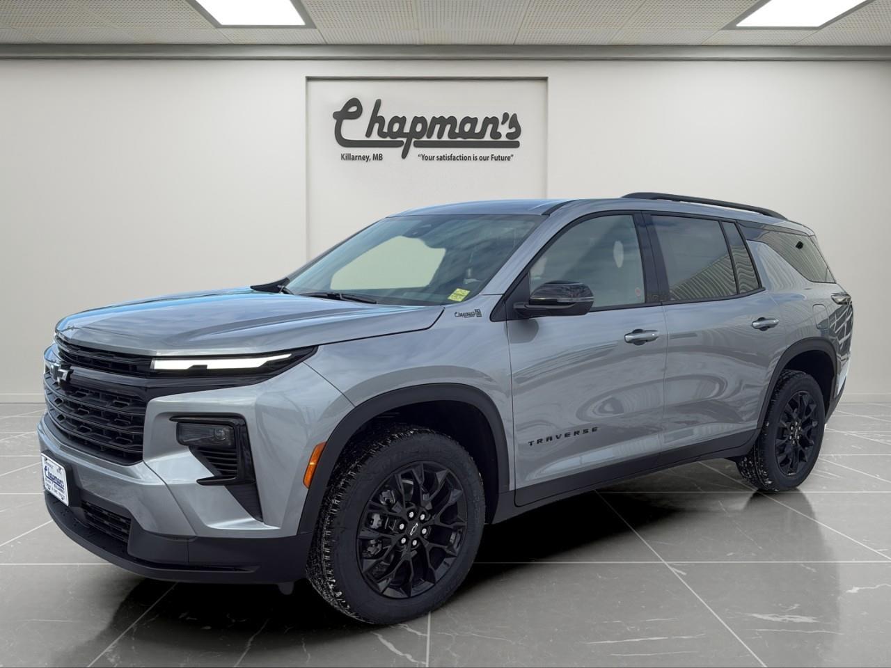 <p>Finished in Sterling Grey Metallic with a Jet Black Evotex interior, this 2026 Chevrolet Traverse LT AWD is a modern family SUV designed for comfort, space, and everyday versatility. With 7-passenger seating and a refined interior layout, its built to handle everything from daily commutes to long road trips with ease.</p><p>Powered by a 2.5L Turbo engine paired with an 8-speed automatic transmission, this Traverse delivers a strong balance of performance and efficiency. With all-wheel drive and integrated trailering equipment, its ready for changing road conditions and weekend hauling alike.</p><h3>Performance & Capability</h3><ul><li><p>2.5L Turbo DOHC engine</p></li><li><p>8-speed automatic transmission</p></li><li><p>All-wheel drive (AWD)</p></li><li><p>Trailering equipment with hitch guidance</p></li><li><p>Engine block heater</p></li></ul><h3>Interior Comfort & Convenience</h3><ul><li><p>7-passenger seating configuration</p></li><li><p>8-way power driver seat</p></li><li><p>Heated steering wheel</p></li><li><p>Dual-zone automatic climate control</p></li><li><p>Wireless phone charging</p></li><li><p>AutoSense power liftgate</p></li><li><p>Remote start capability</p></li><li><p>Active noise cancellation</p></li><li><p>Sliding rear seating with flexible cargo space</p></li></ul><h3>Technology & Connectivity</h3><ul><li><p>11" digital driver information centre</p></li><li><p>Wireless phone charging</p></li><li><p>Multiple USB ports (6 total)</p></li><li><p>SiriusXM satellite radio</p></li><li><p>OnStar services with connected capabilities</p></li></ul><h3>Safety & Driver Assistance</h3><ul><li><p>Enhanced automatic emergency braking</p></li><li><p>Forward collision alert</p></li><li><p>Lane keep assist with departure warning</p></li><li><p>Rear park assist</p></li><li><p>Following distance indicator</p></li><li><p>Side bicyclist alert</p></li></ul><h3>Exterior Highlights</h3><ul><li><p>Sterling Grey Metallic exterior</p></li><li><p>20" high gloss black aluminum wheels</p></li><li><p>Midnight/Sport Edition black styling package</p></li><li><p>Black grille, bowties, and nameplates</p></li><li><p>Roof rails</p></li><li><p>Deep-tinted rear glass</p></li></ul><p>A spacious AWD SUV that blends turbocharged performance, modern technology, and family-focused versatility for everyday driving.</p><p>2 Year/24,000 kilometer* Complimentary Oil Changes (2 total)</p><p>3 Year/60,000 kilometer* Base Warranty Coverage</p><p>5 Year/100,000 kilometer* Powertrain Component Warranty Coverage</p><p>5 Year/100,000 kilometer* Courtesy Transportation and 24/7 Roadside Assistance</p><p>6 Year/160,000 kilometer* Sheet Metal (Rust Through) Perforation Warranty Coverage</p><p>*Whichever Comes First.</p><p>Price Includes Dealer Fee.</p><p>Price Excludes PST & GST.</p><p>Financing Options Available, Call For More Details.</p> <p><strong>*While every reasonable effort is made to ensure the accuracy of this information, we are not responsible for any error or omissions contained on these pages. Please verify any information in question with Chapman Motors Ltd.</strong></p>