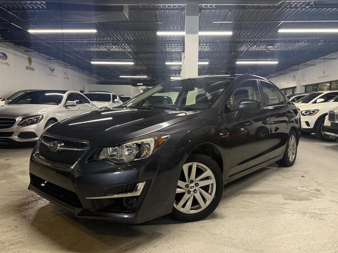 2016 Subaru Impreza Sport & Tech Pkg l ONE OWNER l AWD l 2.0i l Photo
