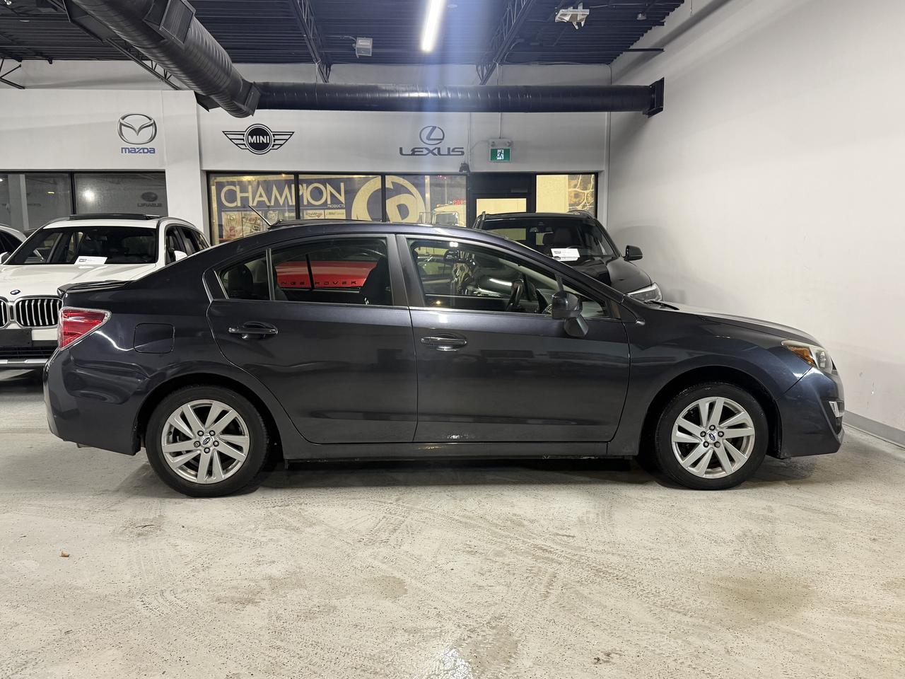 2016 Subaru Impreza Sport & Tech Pkg l ONE OWNER l AWD l 2.0i l Photo