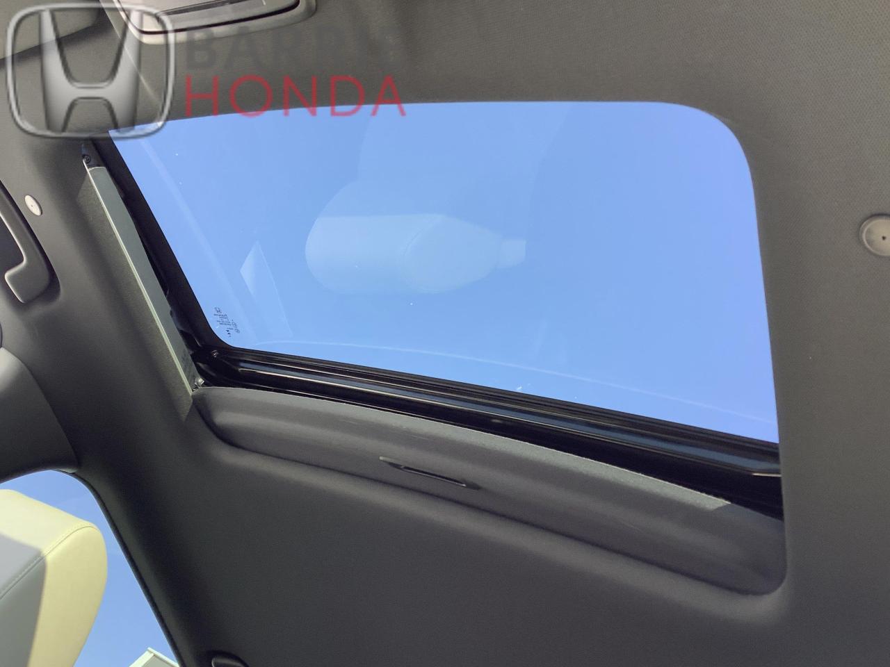 2024 Honda CR-V Hybrid Touring 4dr All-Wheel Drive Photo2