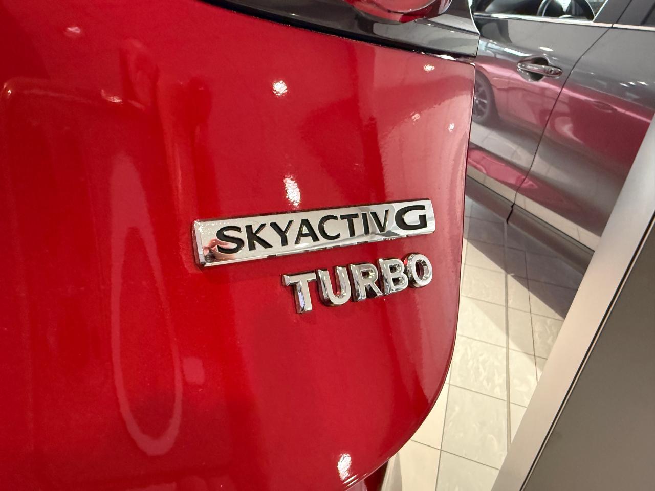 2026 Mazda 3 GT w/Turbo (A6) 4dr i-ACTIV All-Wheel Drive Sport Photo3