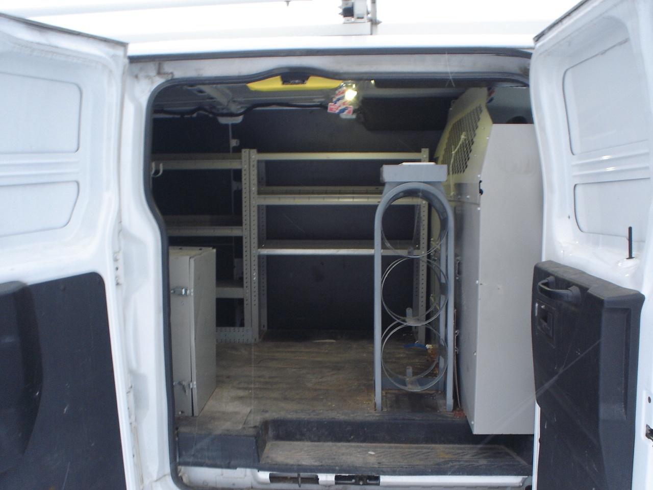 2017 Ford Transit Cargo Van T-250 130" Low Rf 9000 GVWR Swing-Out RH Dr Photo