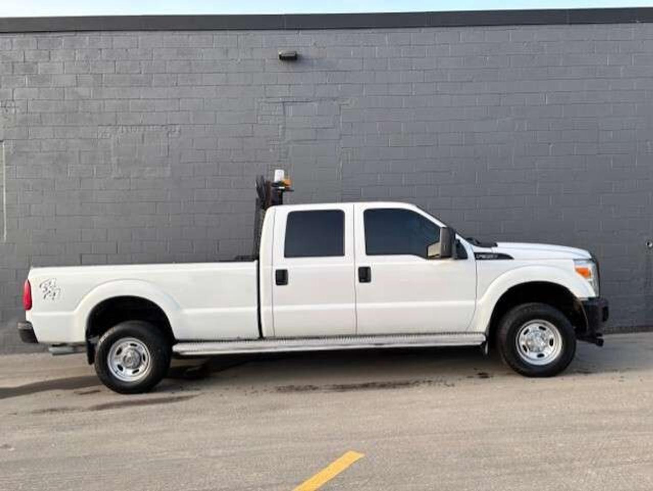 2015 Ford F-350 4WD-CREW CAB-8 FT LONG BOX-ARROW BOARD-CERTIFIED!! Photo