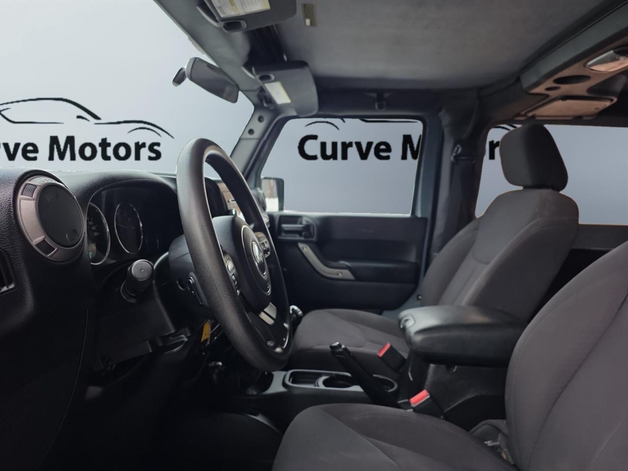 2015 Jeep Wrangler 4WD 2dr Sport * NO ACCIDENTS / MANUAL / BLUETOOTH Photo