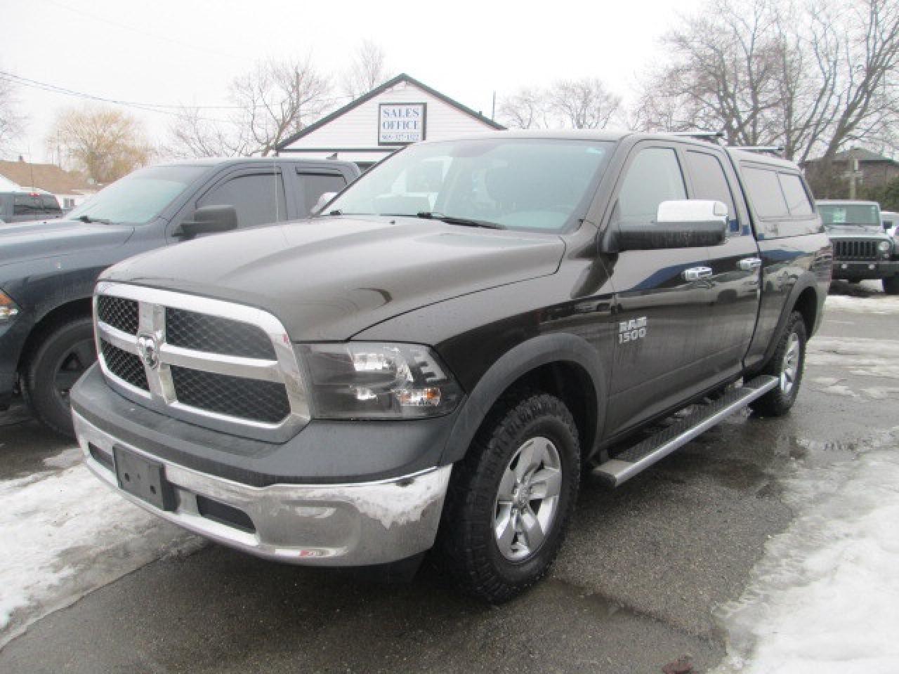 2013 RAM 1500 4WD Quad Cab 140.5  ST, Liner, Cap, Side Steps Photo