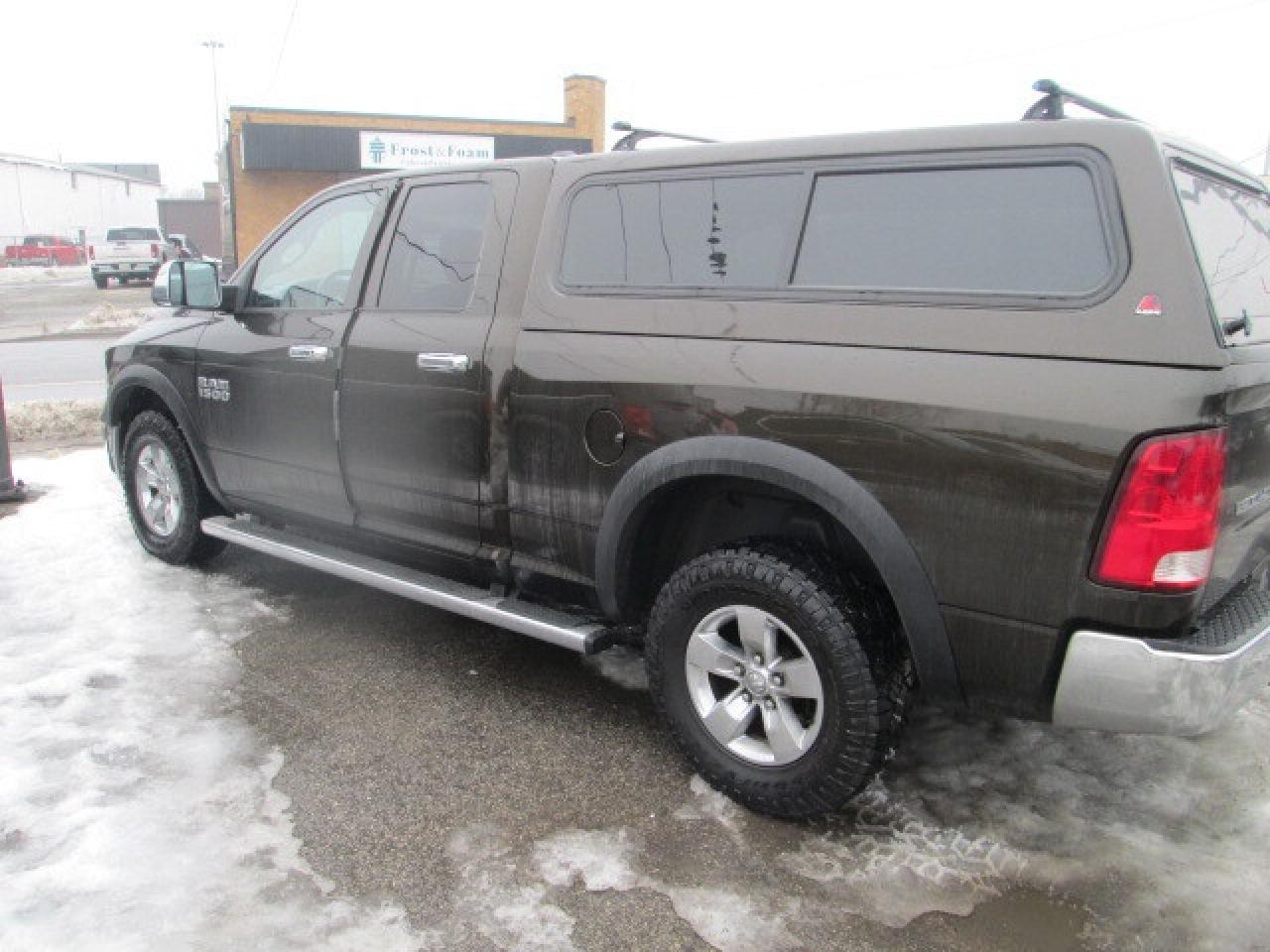 2013 RAM 1500 4WD Quad Cab 140.5  ST, Liner, Cap, Side Steps Photo