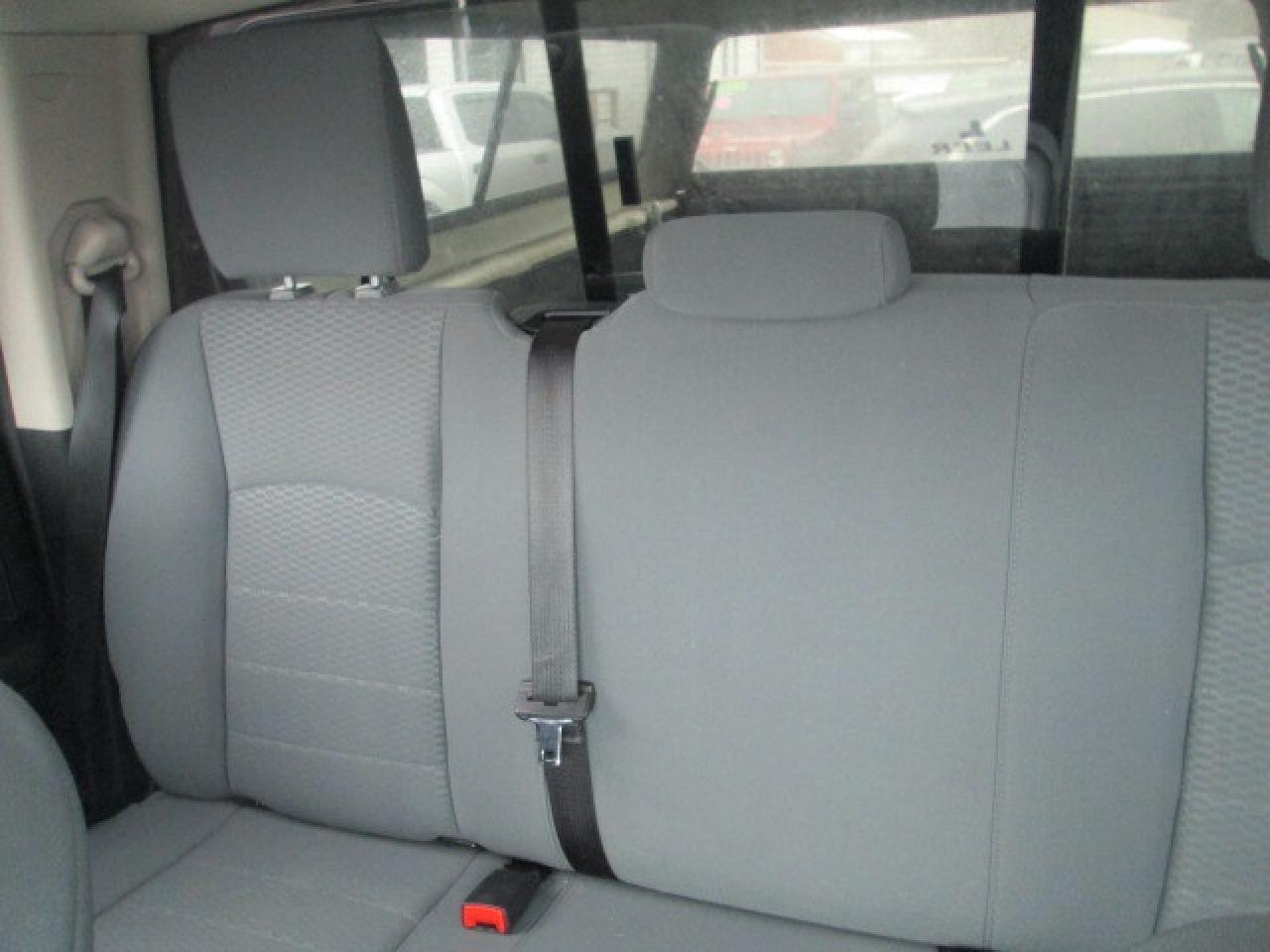 2013 RAM 1500 4WD Quad Cab 140.5  ST, Liner, Cap, Side Steps Photo