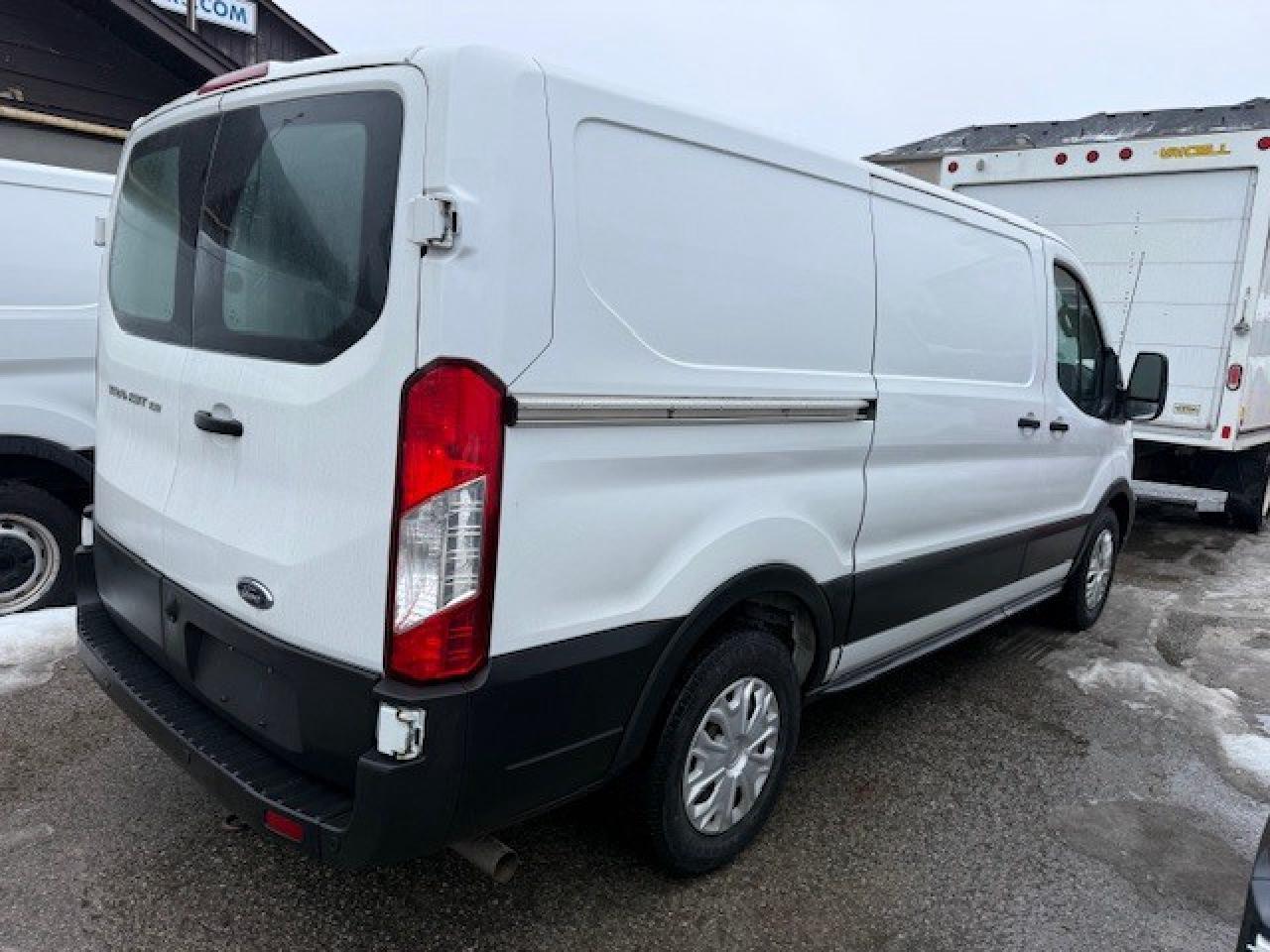 2020 Ford Transit Cargo Van Shelving, Divider, Work ready. Photo