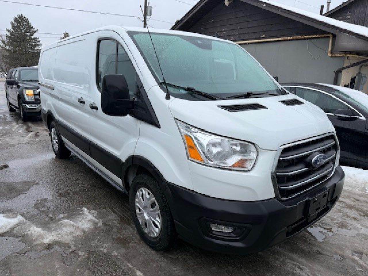 2020 Ford Transit Cargo Van Shelving, Divider, Work ready. Photo