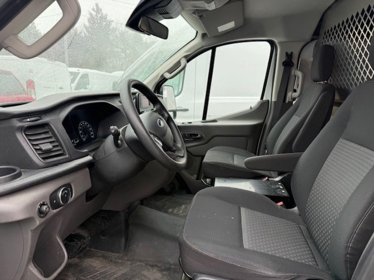 2020 Ford Transit Cargo Van Shelving, Divider, Work ready. Photo