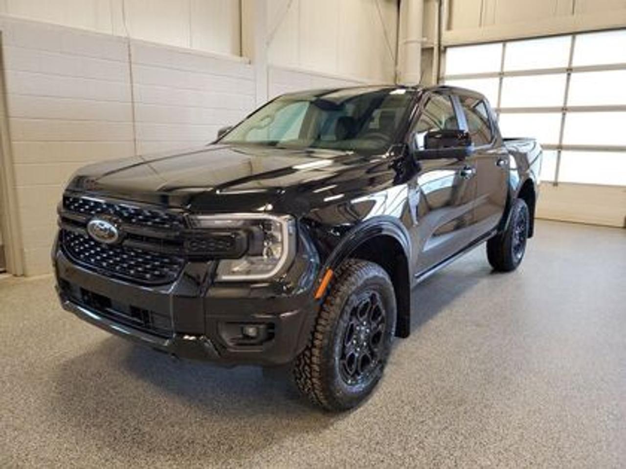 This all-new 2026 Ford Ranger Lariat 500A looks absolutely stunning in Shadow Black. This versatile compact pickup comes equipped with the 2.3L EcoBoost® engine, producing 270 horsepower and 310 lb-ft of torque. By leveraging EcoBoost® technology and a 10-speed automatic transmission, this truck is designed to achieve 11.2L/100 km (25 miles per gallon) combined highway/city fuel economy.

Key Features:
12 Centre Display
Dual Zone Temperature Control 
Rear Window W/Privacy Glass & Defrost
Ford Co-Pilot360
360 Degree Camera
Lane Keeping System 
Rear Parking Sensors
Adaptive Cruise Control and Speed Sign Recognition
Reverse Break Assist 
B&O® System by Bang & Olufsen with HD Radio
Intelligent Access with Push-Button Start
10-Way Power Drivers Seat 
Heated Front Seats 
Cruise Control
Universal Garage Door Opener
FordPass Connect
Selectable Drive Modes
12 Cluster Display
FX4 Off Road Package
Black Appearance Package
Engine Block Heater

Moose Jaw Ford, conveniently located at 1010 North Service Road in Moose Jaw, is your trusted destination for all your automotive needs. With an impressive 4.8-star Google rating from nearly 1,500 reviews, we are proud to deliver an exceptional vehicle-buying experience tailored just for you. Our Moose Jaw Motives set us apart, offering unbeatable value like half-priced oil changes for life on pre-owned vehicles, one year of key and remote protection, and one year of tire and rim protection. Enjoy peace of mind with every purchase. At Moose Jaw Ford, were committed to driving positive change in our community by combining exceptional service, high-quality vehicles, and a guest-first approach. Visit us today!