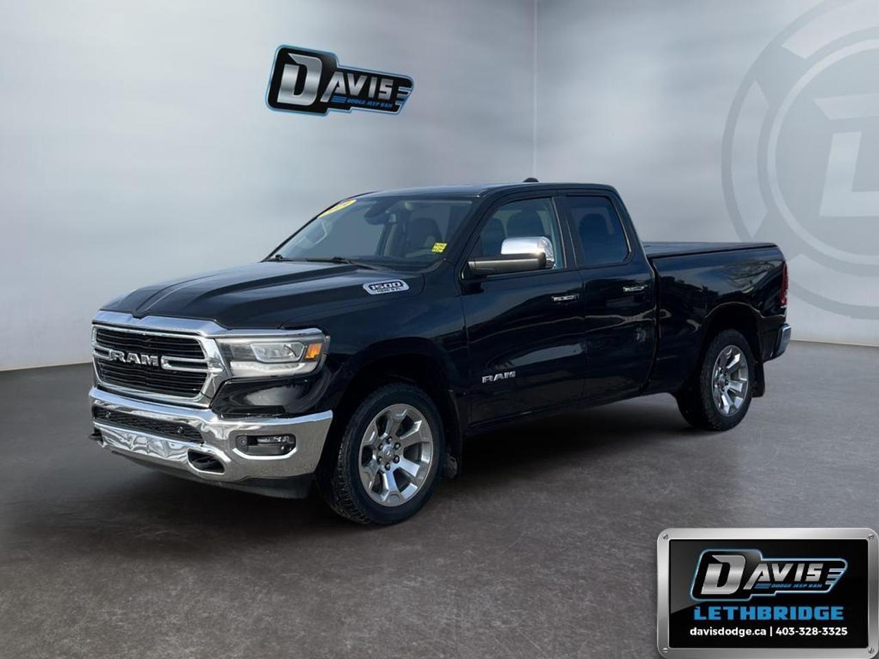 <b>Aluminum Wheels, Chrome Accents, Proximity Key, Touchscreen, Streaming Audio!<br /> <br /></b><br /> Drive with confidence in this 2019 Ram 1500 Big Horn Quad Cab 4x4, featuring a powerful 5.7L HEMI V8 engine paired with an 8-speed automatic transmission. Equipped for towing and off-road adventures, it includes trailer sway damping, hill start assist, electronic roll mitigation, and a Class IV receiver hitch.<br /><br />Inside, enjoy comfort and convenience with deluxe cloth seats, heated front seats, dual-zone automatic climate control, Uconnect 4 with 8.4 touchscreen, Apple CarPlay, Android Auto, and a media hub with multiple USB ports. Safety features include ParkView rear backup camera, ParkSense front and rear park assist, blind spot monitoring, and supplemental side-curtain airbags.<br /><br />Exterior highlights feature Diamond Black Crystal paint, LED tail lamps and reflector headlamps, chrome grille and bumpers, 20 aluminum wheels, full-size and temporary spare tires, and tow hooks for rugged readiness.<br /> <br />To apply right now for financing use this link: <a href=https://lethbridge.davisdodge.ca/free-credit-check/ target=_blank rel=nofollow noopener noreferrer>https://lethbridge.davisdodge.ca/free-credit-check/</a><br /> <br /><br />Locally Owned & Trusted for Over 35 Years  Davis Dodge in Lethbridge, AB <br /><br /> At Davis Dodge, weve proudly served the Lethbridge community for more than 35 years, offering an unparalleled car buying experience. Dont just take our word for itour Google reviews speak volumes about our commitment to exceptional service. <br /><br /> Delivery & At-Home Test Drives: Convenient options to suit your lifestyle. <br /><br /> Flexible Financing for Everyone: Get the vehicle you need with financing solutions tailored to your situation. <br /><br /> Full Mechanical Inspections & Professional Cleaning: Every vehicle is thoroughly inspected and cleaned before it hits our lot.<br /><br /> We take all makes and models on trade and offer competitive pricing with inventory that changes daily. Whether you're shopping for a Chrysler, Dodge, Jeep, RAM, or FIAT, our AMVIC Licensed dealership makes it easy to browse, buy, and drive away.<br /><br /> Located in Lethbridge, AB, we proudly serve customers in Fort Macleod, Taber, Claresholm, and Coaldale. Shop online or visit us today to experience the best in sales, service, and selection. Standard bank rates apply; taxes are additional.<br /><br /> Vehicle pricing offer shown expires 2026-06-30. <br /> Come by and check out our fleet of 50+ used cars and trucks and 110+ new cars and trucks for sale in Lethbridge. o~o