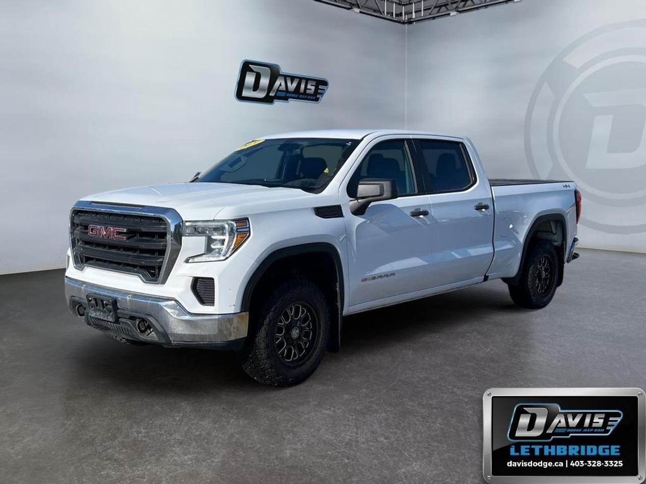<b>Back up Camera, Trailer Brake, Bluetooth, USB/USB-C Charging ports</b><br /> The 2021 GMC Sierra 1500 is a powerful and versatile full-size pickup built for work and play. Equipped with a 5.3L EcoTec3 V8 engine and 6-speed automatic transmission, it offers impressive towing and hauling capability, enhanced by Autotrac single-speed 4WD, trailer sway control, and hill start assist. LED headlamps, daytime running lights, and LED taillamps provide a modern look while improving visibility, and front recovery hooks and corner-step rear bumper add practical utility.<br /><br />Inside, the Sierra 1500 delivers comfort and convenience with a 40/20/40 split bench seat, heated front seats, rear 60/40 folding bench, dual-zone air conditioning, and power windows and locks. The cabin features a 7-inch GMC Infotainment touchscreen with Apple CarPlay, Android Auto, and Bluetooth audio streaming, keeping drivers connected on the road. Additional touches like rear air vents, driver information center, and assist handles make every drive more comfortable for passengers.<br /><br />Safety and confidence are a priority with StabiliTrak electronic stability control, rear vision camera, Teen Driver mode, and automatic front and rear lighting. Optional upgrades like the Fleet Convenience Package, Trailering Package, and Integrated Trailer Brake Controller further enhance its capability for heavy-duty tasks. With its combination of rugged performance, smart technology, and premium features, the 2021 GMC Sierra 1500 is a reliable choice for both work and everyday driving.<br /> <br />To apply right now for financing use this link: <a href=https://lethbridge.davisdodge.ca/free-credit-check/ target=_blank rel=nofollow noopener noreferrer>https://lethbridge.davisdodge.ca/free-credit-check/</a><br /> <br /><br />Locally Owned & Trusted for Over 35 Years  Davis Dodge in Lethbridge, AB <br /><br /> At Davis Dodge, weve proudly served the Lethbridge community for more than 35 years, offering an unparalleled car buying experience. Dont just take our word for itour Google reviews speak volumes about our commitment to exceptional service. <br /><br /> Delivery & At-Home Test Drives: Convenient options to suit your lifestyle. <br /><br /> Flexible Financing for Everyone: Get the vehicle you need with financing solutions tailored to your situation. <br /><br /> Full Mechanical Inspections & Professional Cleaning: Every vehicle is thoroughly inspected and cleaned before it hits our lot.<br /><br /> We take all makes and models on trade and offer competitive pricing with inventory that changes daily. Whether you're shopping for a Chrysler, Dodge, Jeep, RAM, or FIAT, our AMVIC Licensed dealership makes it easy to browse, buy, and drive away.<br /><br /> Located in Lethbridge, AB, we proudly serve customers in Fort Macleod, Taber, Claresholm, and Coaldale. Shop online or visit us today to experience the best in sales, service, and selection. Standard bank rates apply; taxes are additional.<br /><br /> Vehicle pricing offer shown expires 2026-06-30. <br /> Come by and check out our fleet of 50+ used cars and trucks and 110+ new cars and trucks for sale in Lethbridge. o~o