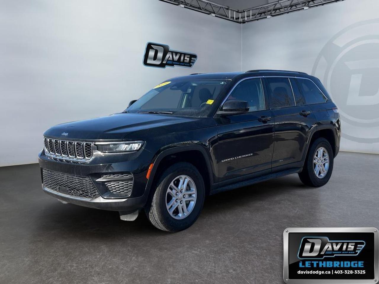 <b>Heated Seats, Heated Steering Wheel, Apple CarPlay, Android Auto, Wi-Fi!<br /> <br /></b><br /> The 2023 Jeep Grand Cherokee Laredo is a versatile midsize SUV that blends rugged capability with modern comfort. Powered by a 3.6L V6 engine and 8-speed automatic transmission, it features Quadra-Trac I 4WD, hill start assist, trailer sway damping, and electronic stability control, making it ready for city streets, highways, or off-road adventures. With LED headlamps and daytime running lights, this Grand Cherokee stands out with style and functionality.<br /><br />Inside, the Laredo offers five-passenger seating with heated front seats, dual-zone automatic climate control, and cloth upholstery. The cabin is equipped with Uconnect 5 and a 10.25" color display, supporting Apple CarPlay, Google Android Auto, and multiple USB ports for seamless connectivity. Practical touches like a full-length floor console, cargo tie-downs, and rear 60/40 folding seats make it ideal for families or weekend getaways.<br /><br />Safety and driver confidence are prioritized with features such as ParkView rear backup camera, blind spot and cross-path detection, adaptive cruise control with stop-and-go, and lane management assistance. Additional highlights include a power sunroof, power-adjustable mirrors, and all-aluminum wheels, ensuring the 2023 Jeep Grand Cherokee Laredo delivers a perfect balance of capability, comfort, and style for every journey.<br /> <br />To apply right now for financing use this link: <a href=https://lethbridge.davisdodge.ca/free-credit-check/ target=_blank rel=nofollow noopener noreferrer>https://lethbridge.davisdodge.ca/free-credit-check/</a><br /> <br /><br />Locally Owned & Trusted for Over 35 Years  Davis Dodge in Lethbridge, AB <br /><br /> At Davis Dodge, weve proudly served the Lethbridge community for more than 35 years, offering an unparalleled car buying experience. Dont just take our word for itour Google reviews speak volumes about our commitment to exceptional service. <br /><br /> Delivery & At-Home Test Drives: Convenient options to suit your lifestyle. <br /><br /> Flexible Financing for Everyone: Get the vehicle you need with financing solutions tailored to your situation. <br /><br /> Full Mechanical Inspections & Professional Cleaning: Every vehicle is thoroughly inspected and cleaned before it hits our lot.<br /><br /> We take all makes and models on trade and offer competitive pricing with inventory that changes daily. Whether you're shopping for a Chrysler, Dodge, Jeep, RAM, or FIAT, our AMVIC Licensed dealership makes it easy to browse, buy, and drive away.<br /><br /> Located in Lethbridge, AB, we proudly serve customers in Fort Macleod, Taber, Claresholm, and Coaldale. Shop online or visit us today to experience the best in sales, service, and selection. Standard bank rates apply; taxes are additional.<br /><br /> Vehicle pricing offer shown expires 2026-06-30. <br /> Come by and check out our fleet of 50+ used cars and trucks and 110+ new cars and trucks for sale in Lethbridge. o~o